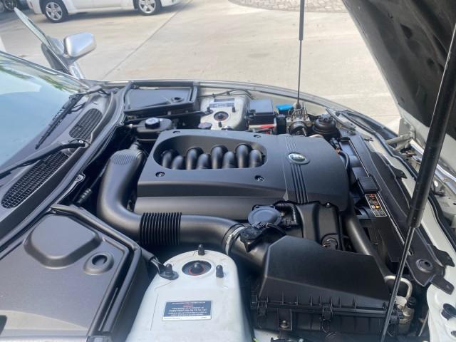 2004 Quartz /Charcoal Jaguar XK8 CONV LOW MILES 22,152 (SAJDA42CX42) with an 4.2L DOHC EFI 32-Valve Aluminum Alloy V8 Engine engine, Automatic transmission, located at 4701 North Dixie Hwy, Pompano Beach, FL, 33064, (954) 422-2889, 26.240938, -80.123474 - OUR WEBPAGE FLORIDACARS1.COM HAS OVER 100 PHOTOS AND FREE CARFAX LINK 2004 JAGUAR XK-SERIES XK8 $ 75,530 NEW VIN: SAJDA42CX42A37634 S A J D A 4 2 C X 4 2 A 3 7 6 3 4 CONVERTIBLE 4.2L V8 F DOHC GASOLINE REAR WHEEL DRIVE TOP WORKS GREAT! TIRES ARE LIKE NEW! Top Features Alloy Wheels Leather Seats Alpi - Photo#25
