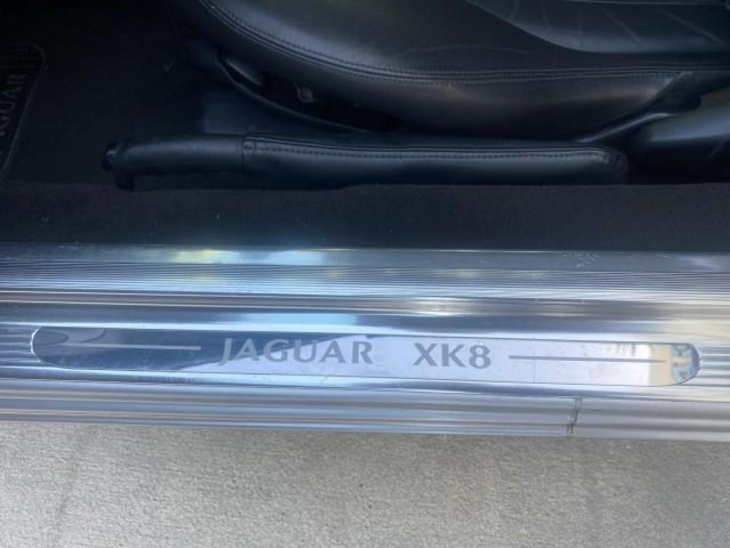 2004 Quartz /Charcoal Jaguar XK8 XK8 CONV LOW MILES 22,152 (SAJDA42CX42) with an 4.2L DOHC EFI 32-Valve Aluminum Alloy V8 Engine engine, Automatic transmission, located at 4701 North Dixie Hwy, Pompano Beach, FL, 33064, (954) 422-2889, 26.240938, -80.123474 - OUR WEBPAGE FLORIDACARS1.COM HAS OVER 100 PHOTOS AND FREE CARFAX LINK 2004 JAGUAR XK-SERIES XK8 $ 75,530 NEW VIN: SAJDA42CX42A37634 S A J D A 4 2 C X 4 2 A 3 7 6 3 4 CONVERTIBLE 4.2L V8 F DOHC GASOLINE REAR WHEEL DRIVE TOP WORKS GREAT! TIRES ARE LIKE NEW! Top Features Alloy Wheels Leather Seats Alpi - Photo#31