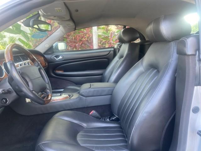 2004 Quartz /Charcoal Jaguar XK8 CONV LOW MILES 22,152 (SAJDA42CX42) with an 4.2L DOHC EFI 32-Valve Aluminum Alloy V8 Engine engine, Automatic transmission, located at 4701 North Dixie Hwy, Pompano Beach, FL, 33064, (954) 422-2889, 26.240938, -80.123474 - OUR WEBPAGE FLORIDACARS1.COM HAS OVER 100 PHOTOS AND FREE CARFAX LINK 2004 JAGUAR XK-SERIES XK8 $ 75,530 NEW VIN: SAJDA42CX42A37634 S A J D A 4 2 C X 4 2 A 3 7 6 3 4 CONVERTIBLE 4.2L V8 F DOHC GASOLINE REAR WHEEL DRIVE TOP WORKS GREAT! TIRES ARE LIKE NEW! Top Features Alloy Wheels Leather Seats Alpi - Photo#33