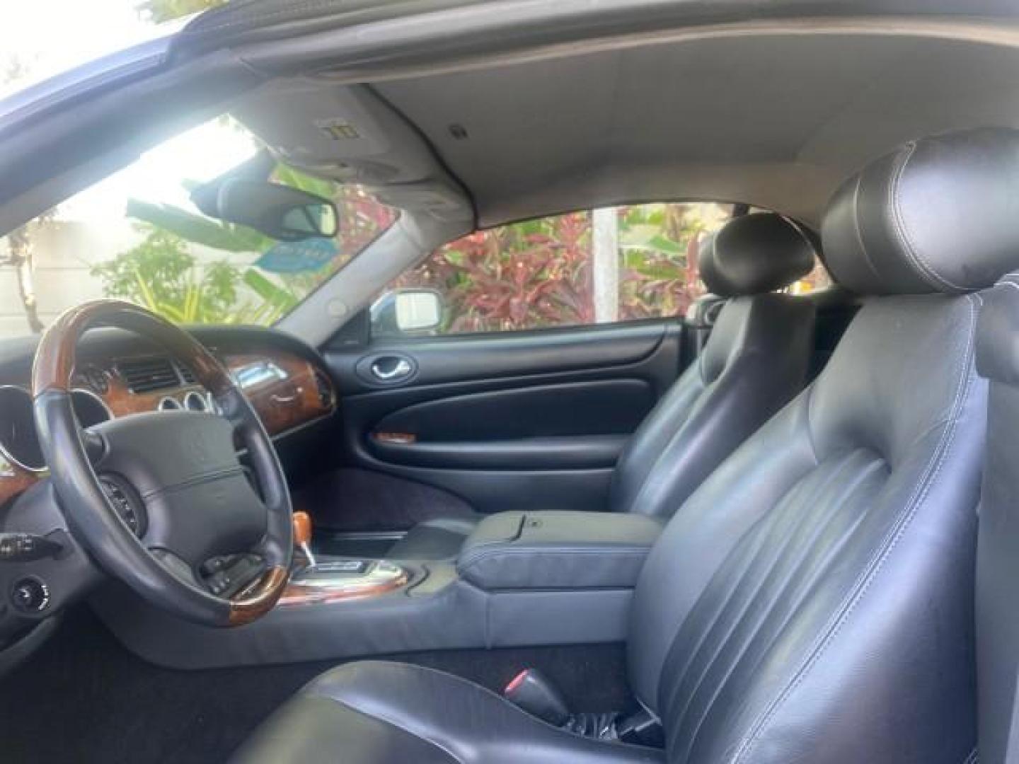 2004 Quartz /Charcoal Jaguar XK8 XK8 CONV LOW MILES 22,152 (SAJDA42CX42) with an 4.2L DOHC EFI 32-Valve Aluminum Alloy V8 Engine engine, Automatic transmission, located at 4701 North Dixie Hwy, Pompano Beach, FL, 33064, (954) 422-2889, 26.240938, -80.123474 - OUR WEBPAGE FLORIDACARS1.COM HAS OVER 100 PHOTOS AND FREE CARFAX LINK 2004 JAGUAR XK-SERIES XK8 $ 75,530 NEW VIN: SAJDA42CX42A37634 S A J D A 4 2 C X 4 2 A 3 7 6 3 4 CONVERTIBLE 4.2L V8 F DOHC GASOLINE REAR WHEEL DRIVE TOP WORKS GREAT! TIRES ARE LIKE NEW! Top Features Alloy Wheels Leather Seats Alpi - Photo#35