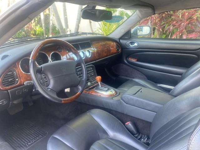2004 Quartz /Charcoal Jaguar XK8 CONV LOW MILES 22,152 (SAJDA42CX42) with an 4.2L DOHC EFI 32-Valve Aluminum Alloy V8 Engine engine, Automatic transmission, located at 4701 North Dixie Hwy, Pompano Beach, FL, 33064, (954) 422-2889, 26.240938, -80.123474 - OUR WEBPAGE FLORIDACARS1.COM HAS OVER 100 PHOTOS AND FREE CARFAX LINK 2004 JAGUAR XK-SERIES XK8 $ 75,530 NEW VIN: SAJDA42CX42A37634 S A J D A 4 2 C X 4 2 A 3 7 6 3 4 CONVERTIBLE 4.2L V8 F DOHC GASOLINE REAR WHEEL DRIVE TOP WORKS GREAT! TIRES ARE LIKE NEW! Top Features Alloy Wheels Leather Seats Alpi - Photo#37