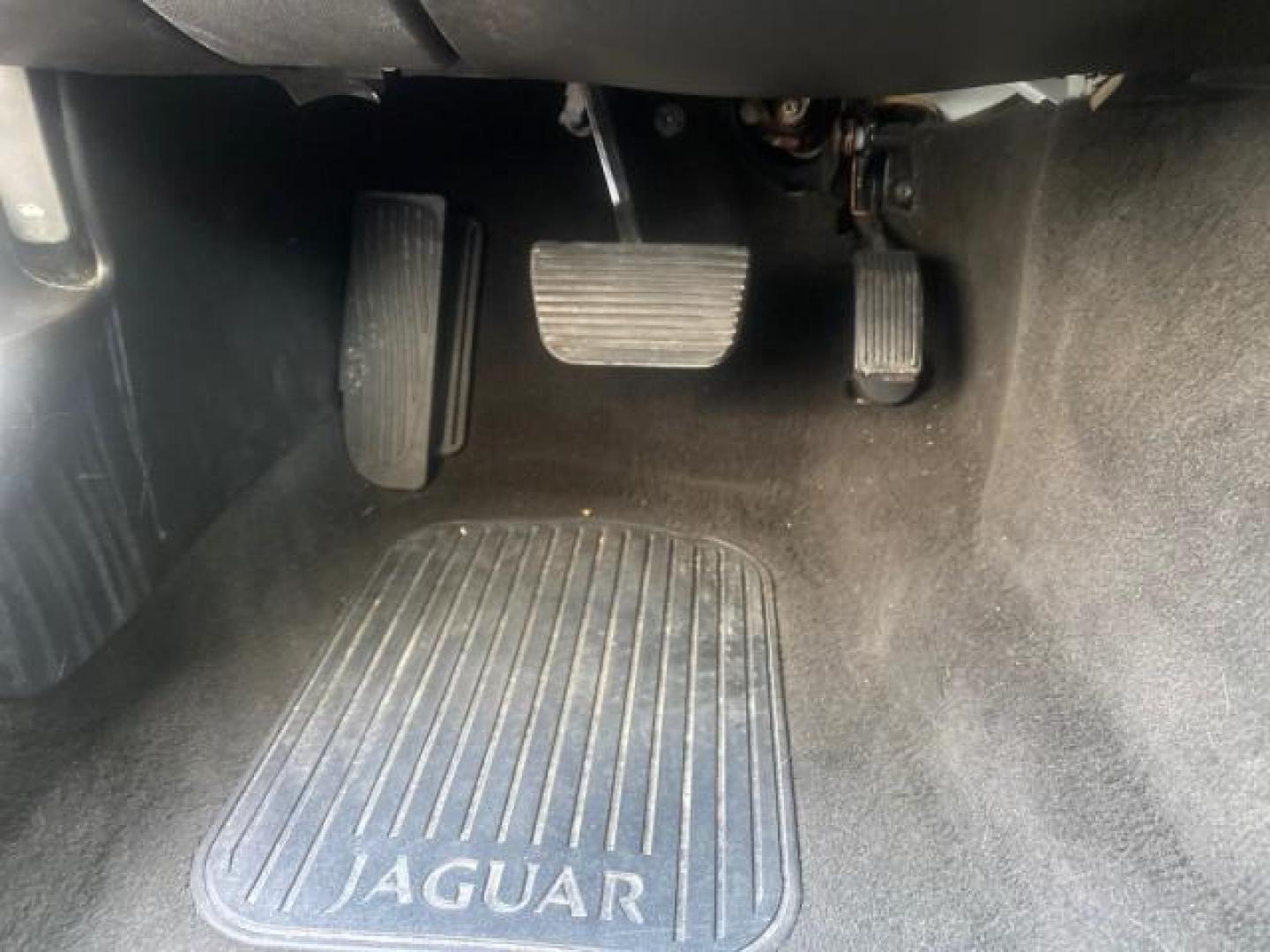 2004 Quartz /Charcoal Jaguar XK8 XK8 CONV LOW MILES 22,152 (SAJDA42CX42) with an 4.2L DOHC EFI 32-Valve Aluminum Alloy V8 Engine engine, Automatic transmission, located at 4701 North Dixie Hwy, Pompano Beach, FL, 33064, (954) 422-2889, 26.240938, -80.123474 - OUR WEBPAGE FLORIDACARS1.COM HAS OVER 100 PHOTOS AND FREE CARFAX LINK 2004 JAGUAR XK-SERIES XK8 $ 75,530 NEW VIN: SAJDA42CX42A37634 S A J D A 4 2 C X 4 2 A 3 7 6 3 4 CONVERTIBLE 4.2L V8 F DOHC GASOLINE REAR WHEEL DRIVE TOP WORKS GREAT! TIRES ARE LIKE NEW! Top Features Alloy Wheels Leather Seats Alpi - Photo#45