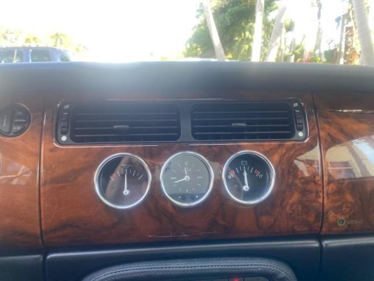 2004 Quartz /Charcoal Jaguar XK8 XK8 CONV LOW MILES 22,152 (SAJDA42CX42) with an 4.2L DOHC EFI 32-Valve Aluminum Alloy V8 Engine engine, Automatic transmission, located at 4701 North Dixie Hwy, Pompano Beach, FL, 33064, (954) 422-2889, 26.240938, -80.123474 - OUR WEBPAGE FLORIDACARS1.COM HAS OVER 100 PHOTOS AND FREE CARFAX LINK 2004 JAGUAR XK-SERIES XK8 $ 75,530 NEW VIN: SAJDA42CX42A37634 S A J D A 4 2 C X 4 2 A 3 7 6 3 4 CONVERTIBLE 4.2L V8 F DOHC GASOLINE REAR WHEEL DRIVE TOP WORKS GREAT! TIRES ARE LIKE NEW! Top Features Alloy Wheels Leather Seats Alpi - Photo#47