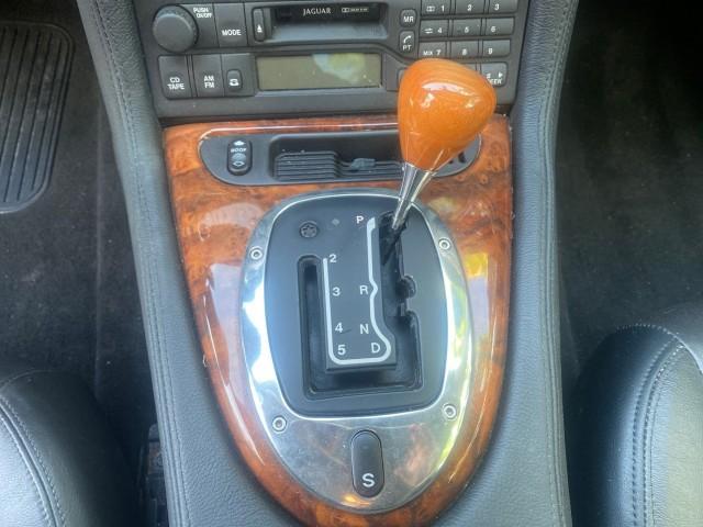 2004 Quartz /Charcoal Jaguar XK8 CONV LOW MILES 22,152 (SAJDA42CX42) with an 4.2L DOHC EFI 32-Valve Aluminum Alloy V8 Engine engine, Automatic transmission, located at 4701 North Dixie Hwy, Pompano Beach, FL, 33064, (954) 422-2889, 26.240938, -80.123474 - OUR WEBPAGE FLORIDACARS1.COM HAS OVER 100 PHOTOS AND FREE CARFAX LINK 2004 JAGUAR XK-SERIES XK8 $ 75,530 NEW VIN: SAJDA42CX42A37634 S A J D A 4 2 C X 4 2 A 3 7 6 3 4 CONVERTIBLE 4.2L V8 F DOHC GASOLINE REAR WHEEL DRIVE TOP WORKS GREAT! TIRES ARE LIKE NEW! Top Features Alloy Wheels Leather Seats Alpi - Photo#49