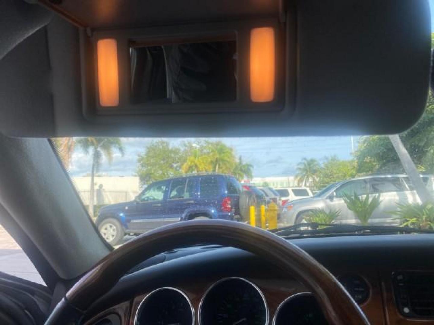 2004 Quartz /Charcoal Jaguar XK8 XK8 CONV LOW MILES 22,152 (SAJDA42CX42) with an 4.2L DOHC EFI 32-Valve Aluminum Alloy V8 Engine engine, Automatic transmission, located at 4701 North Dixie Hwy, Pompano Beach, FL, 33064, (954) 422-2889, 26.240938, -80.123474 - OUR WEBPAGE FLORIDACARS1.COM HAS OVER 100 PHOTOS AND FREE CARFAX LINK 2004 JAGUAR XK-SERIES XK8 $ 75,530 NEW VIN: SAJDA42CX42A37634 S A J D A 4 2 C X 4 2 A 3 7 6 3 4 CONVERTIBLE 4.2L V8 F DOHC GASOLINE REAR WHEEL DRIVE TOP WORKS GREAT! TIRES ARE LIKE NEW! Top Features Alloy Wheels Leather Seats Alpi - Photo#56