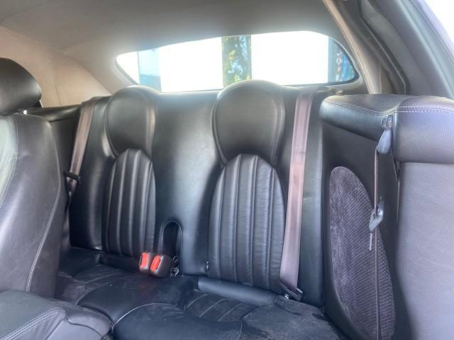 2004 Quartz /Charcoal Jaguar XK8 CONV LOW MILES 22,152 (SAJDA42CX42) with an 4.2L DOHC EFI 32-Valve Aluminum Alloy V8 Engine engine, Automatic transmission, located at 4701 North Dixie Hwy, Pompano Beach, FL, 33064, (954) 422-2889, 26.240938, -80.123474 - OUR WEBPAGE FLORIDACARS1.COM HAS OVER 100 PHOTOS AND FREE CARFAX LINK 2004 JAGUAR XK-SERIES XK8 $ 75,530 NEW VIN: SAJDA42CX42A37634 S A J D A 4 2 C X 4 2 A 3 7 6 3 4 CONVERTIBLE 4.2L V8 F DOHC GASOLINE REAR WHEEL DRIVE TOP WORKS GREAT! TIRES ARE LIKE NEW! Top Features Alloy Wheels Leather Seats Alpi - Photo#60