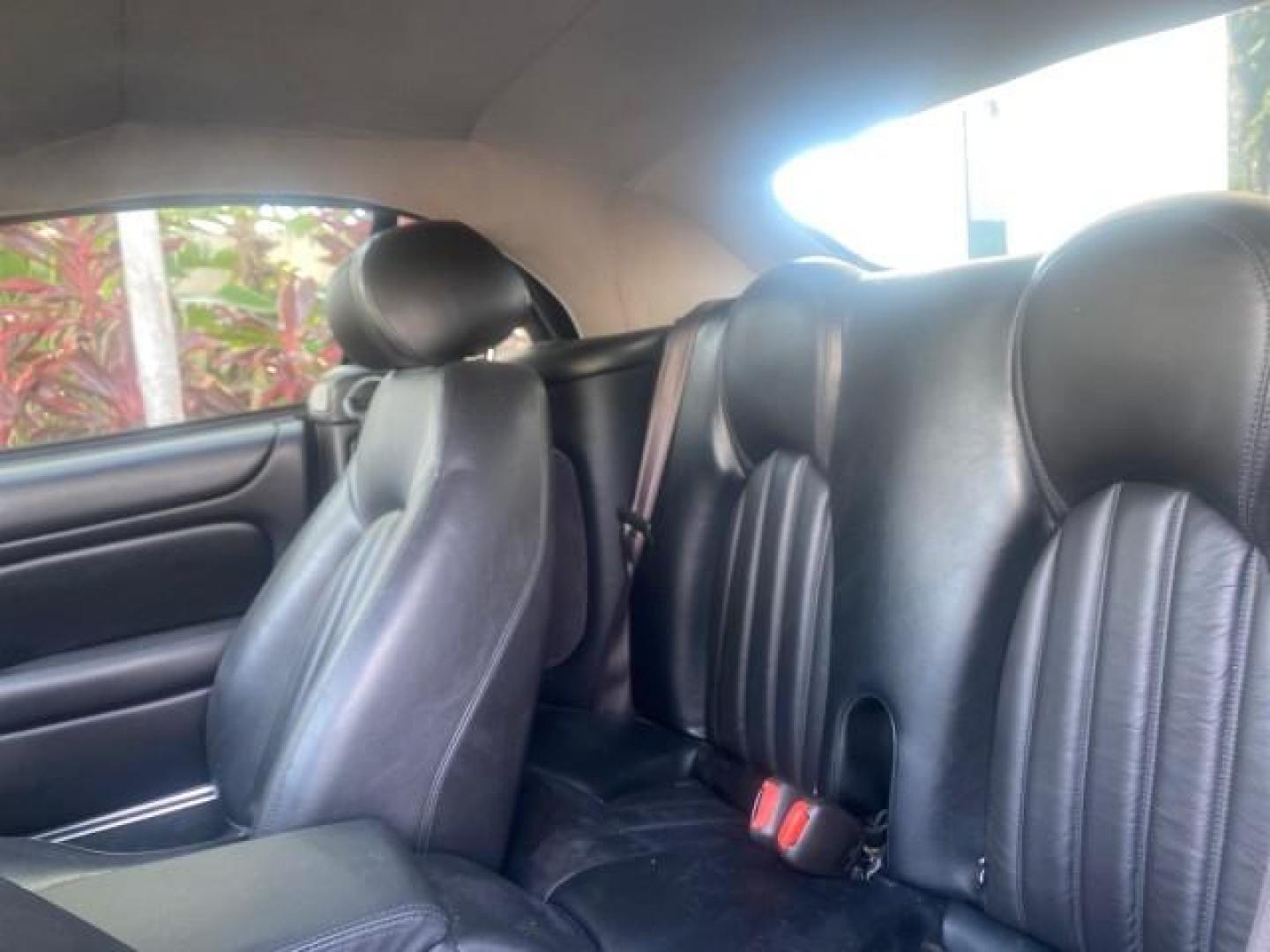 2004 Quartz /Charcoal Jaguar XK8 XK8 CONV LOW MILES 22,152 (SAJDA42CX42) with an 4.2L DOHC EFI 32-Valve Aluminum Alloy V8 Engine engine, Automatic transmission, located at 4701 North Dixie Hwy, Pompano Beach, FL, 33064, (954) 422-2889, 26.240938, -80.123474 - OUR WEBPAGE FLORIDACARS1.COM HAS OVER 100 PHOTOS AND FREE CARFAX LINK 2004 JAGUAR XK-SERIES XK8 $ 75,530 NEW VIN: SAJDA42CX42A37634 S A J D A 4 2 C X 4 2 A 3 7 6 3 4 CONVERTIBLE 4.2L V8 F DOHC GASOLINE REAR WHEEL DRIVE TOP WORKS GREAT! TIRES ARE LIKE NEW! Top Features Alloy Wheels Leather Seats Alpi - Photo#62