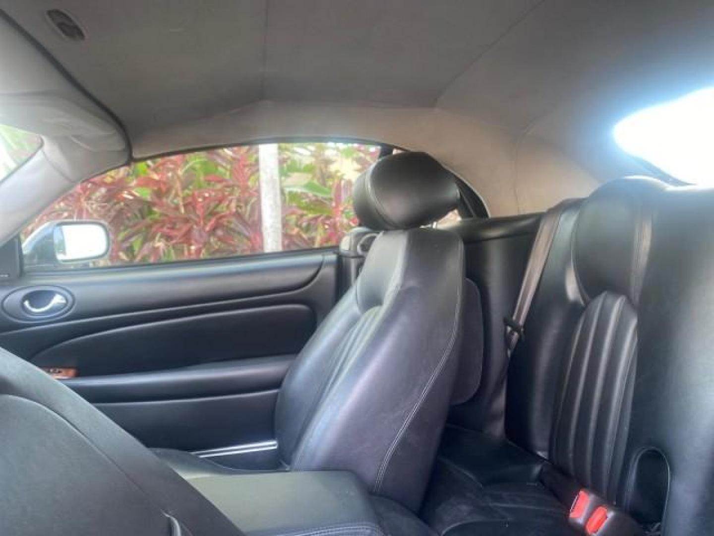 2004 Quartz /Charcoal Jaguar XK8 XK8 CONV LOW MILES 22,152 (SAJDA42CX42) with an 4.2L DOHC EFI 32-Valve Aluminum Alloy V8 Engine engine, Automatic transmission, located at 4701 North Dixie Hwy, Pompano Beach, FL, 33064, (954) 422-2889, 26.240938, -80.123474 - OUR WEBPAGE FLORIDACARS1.COM HAS OVER 100 PHOTOS AND FREE CARFAX LINK 2004 JAGUAR XK-SERIES XK8 $ 75,530 NEW VIN: SAJDA42CX42A37634 S A J D A 4 2 C X 4 2 A 3 7 6 3 4 CONVERTIBLE 4.2L V8 F DOHC GASOLINE REAR WHEEL DRIVE TOP WORKS GREAT! TIRES ARE LIKE NEW! Top Features Alloy Wheels Leather Seats Alpi - Photo#63