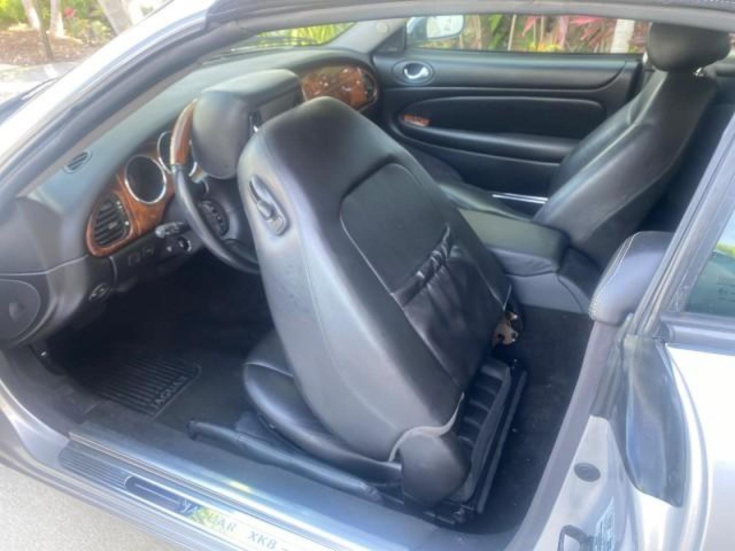 2004 Quartz /Charcoal Jaguar XK8 XK8 CONV LOW MILES 22,152 (SAJDA42CX42) with an 4.2L DOHC EFI 32-Valve Aluminum Alloy V8 Engine engine, Automatic transmission, located at 4701 North Dixie Hwy, Pompano Beach, FL, 33064, (954) 422-2889, 26.240938, -80.123474 - OUR WEBPAGE FLORIDACARS1.COM HAS OVER 100 PHOTOS AND FREE CARFAX LINK 2004 JAGUAR XK-SERIES XK8 $ 75,530 NEW VIN: SAJDA42CX42A37634 S A J D A 4 2 C X 4 2 A 3 7 6 3 4 CONVERTIBLE 4.2L V8 F DOHC GASOLINE REAR WHEEL DRIVE TOP WORKS GREAT! TIRES ARE LIKE NEW! Top Features Alloy Wheels Leather Seats Alpi - Photo#64