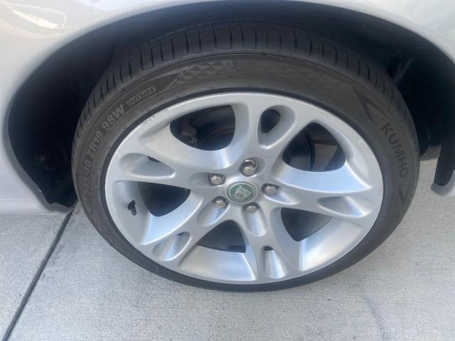 2004 Quartz /Charcoal Jaguar XK8 CONV LOW MILES 22,152 (SAJDA42CX42) with an 4.2L DOHC EFI 32-Valve Aluminum Alloy V8 Engine engine, Automatic transmission, located at 4701 North Dixie Hwy, Pompano Beach, FL, 33064, (954) 422-2889, 26.240938, -80.123474 - OUR WEBPAGE FLORIDACARS1.COM HAS OVER 100 PHOTOS AND FREE CARFAX LINK 2004 JAGUAR XK-SERIES XK8 $ 75,530 NEW VIN: SAJDA42CX42A37634 S A J D A 4 2 C X 4 2 A 3 7 6 3 4 CONVERTIBLE 4.2L V8 F DOHC GASOLINE REAR WHEEL DRIVE TOP WORKS GREAT! TIRES ARE LIKE NEW! Top Features Alloy Wheels Leather Seats Alpi - Photo#65