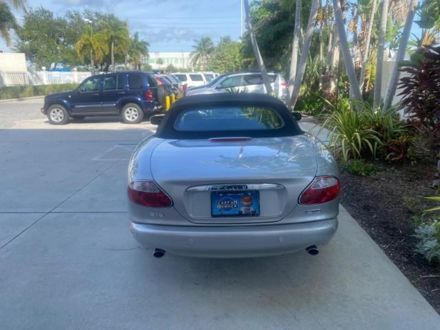 2004 Quartz /Charcoal Jaguar XK8 XK8 CONV LOW MILES 22,152 (SAJDA42CX42) with an 4.2L DOHC EFI 32-Valve Aluminum Alloy V8 Engine engine, Automatic transmission, located at 4701 North Dixie Hwy, Pompano Beach, FL, 33064, (954) 422-2889, 26.240938, -80.123474 - OUR WEBPAGE FLORIDACARS1.COM HAS OVER 100 PHOTOS AND FREE CARFAX LINK 2004 JAGUAR XK-SERIES XK8 $ 75,530 NEW VIN: SAJDA42CX42A37634 S A J D A 4 2 C X 4 2 A 3 7 6 3 4 CONVERTIBLE 4.2L V8 F DOHC GASOLINE REAR WHEEL DRIVE TOP WORKS GREAT! TIRES ARE LIKE NEW! Top Features Alloy Wheels Leather Seats Alpi - Photo#68