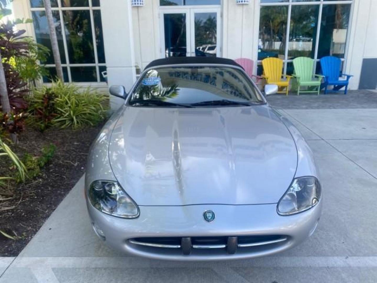 2004 Quartz /Charcoal Jaguar XK8 XK8 CONV LOW MILES 22,152 (SAJDA42CX42) with an 4.2L DOHC EFI 32-Valve Aluminum Alloy V8 Engine engine, Automatic transmission, located at 4701 North Dixie Hwy, Pompano Beach, FL, 33064, (954) 422-2889, 26.240938, -80.123474 - OUR WEBPAGE FLORIDACARS1.COM HAS OVER 100 PHOTOS AND FREE CARFAX LINK 2004 JAGUAR XK-SERIES XK8 $ 75,530 NEW VIN: SAJDA42CX42A37634 S A J D A 4 2 C X 4 2 A 3 7 6 3 4 CONVERTIBLE 4.2L V8 F DOHC GASOLINE REAR WHEEL DRIVE TOP WORKS GREAT! TIRES ARE LIKE NEW! Top Features Alloy Wheels Leather Seats Alpi - Photo#73