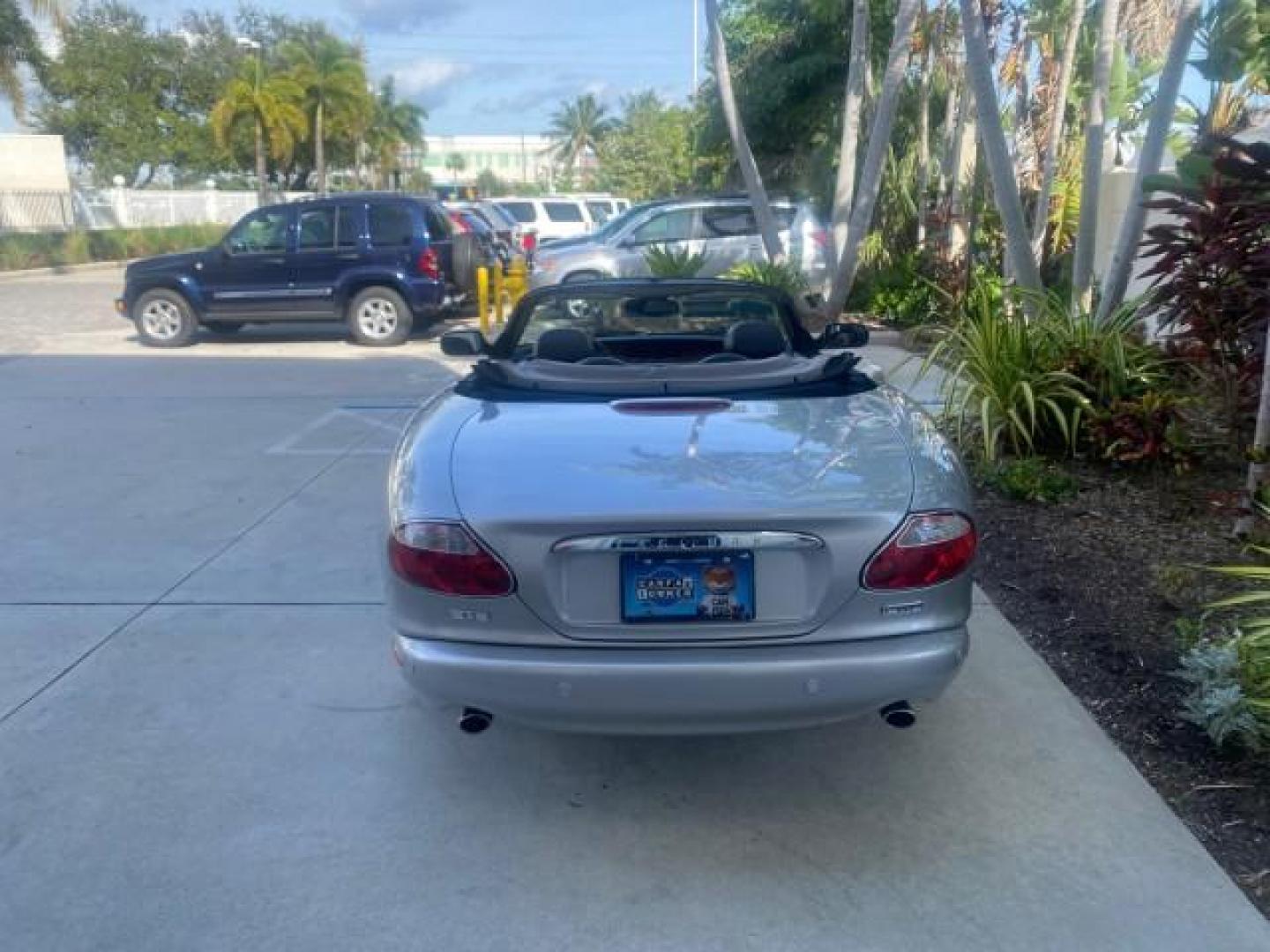 2004 Quartz /Charcoal Jaguar XK8 XK8 CONV LOW MILES 22,152 (SAJDA42CX42) with an 4.2L DOHC EFI 32-Valve Aluminum Alloy V8 Engine engine, Automatic transmission, located at 4701 North Dixie Hwy, Pompano Beach, FL, 33064, (954) 422-2889, 26.240938, -80.123474 - OUR WEBPAGE FLORIDACARS1.COM HAS OVER 100 PHOTOS AND FREE CARFAX LINK 2004 JAGUAR XK-SERIES XK8 $ 75,530 NEW VIN: SAJDA42CX42A37634 S A J D A 4 2 C X 4 2 A 3 7 6 3 4 CONVERTIBLE 4.2L V8 F DOHC GASOLINE REAR WHEEL DRIVE TOP WORKS GREAT! TIRES ARE LIKE NEW! Top Features Alloy Wheels Leather Seats Alpi - Photo#88