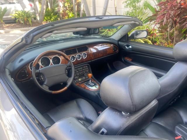 2004 Quartz /Charcoal Jaguar XK8 CONV LOW MILES 22,152 (SAJDA42CX42) with an 4.2L DOHC EFI 32-Valve Aluminum Alloy V8 Engine engine, Automatic transmission, located at 4701 North Dixie Hwy, Pompano Beach, FL, 33064, (954) 422-2889, 26.240938, -80.123474 - OUR WEBPAGE FLORIDACARS1.COM HAS OVER 100 PHOTOS AND FREE CARFAX LINK 2004 JAGUAR XK-SERIES XK8 $ 75,530 NEW VIN: SAJDA42CX42A37634 S A J D A 4 2 C X 4 2 A 3 7 6 3 4 CONVERTIBLE 4.2L V8 F DOHC GASOLINE REAR WHEEL DRIVE TOP WORKS GREAT! TIRES ARE LIKE NEW! Top Features Alloy Wheels Leather Seats Alpi - Photo#91