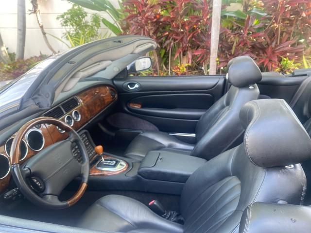 2004 Quartz /Charcoal Jaguar XK8 CONV LOW MILES 22,152 (SAJDA42CX42) with an 4.2L DOHC EFI 32-Valve Aluminum Alloy V8 Engine engine, Automatic transmission, located at 4701 North Dixie Hwy, Pompano Beach, FL, 33064, (954) 422-2889, 26.240938, -80.123474 - OUR WEBPAGE FLORIDACARS1.COM HAS OVER 100 PHOTOS AND FREE CARFAX LINK 2004 JAGUAR XK-SERIES XK8 $ 75,530 NEW VIN: SAJDA42CX42A37634 S A J D A 4 2 C X 4 2 A 3 7 6 3 4 CONVERTIBLE 4.2L V8 F DOHC GASOLINE REAR WHEEL DRIVE TOP WORKS GREAT! TIRES ARE LIKE NEW! Top Features Alloy Wheels Leather Seats Alpi - Photo#92