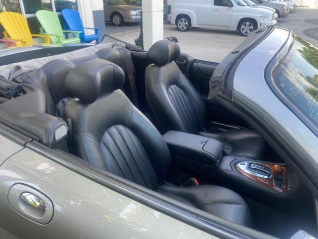2004 Quartz /Charcoal Jaguar XK8 CONV LOW MILES 22,152 (SAJDA42CX42) with an 4.2L DOHC EFI 32-Valve Aluminum Alloy V8 Engine engine, Automatic transmission, located at 4701 North Dixie Hwy, Pompano Beach, FL, 33064, (954) 422-2889, 26.240938, -80.123474 - OUR WEBPAGE FLORIDACARS1.COM HAS OVER 100 PHOTOS AND FREE CARFAX LINK 2004 JAGUAR XK-SERIES XK8 $ 75,530 NEW VIN: SAJDA42CX42A37634 S A J D A 4 2 C X 4 2 A 3 7 6 3 4 CONVERTIBLE 4.2L V8 F DOHC GASOLINE REAR WHEEL DRIVE TOP WORKS GREAT! TIRES ARE LIKE NEW! Top Features Alloy Wheels Leather Seats Alpi - Photo#93