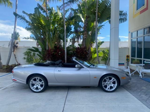 2004 Quartz /Charcoal Jaguar XK8 CONV LOW MILES 22,152 (SAJDA42CX42) with an 4.2L DOHC EFI 32-Valve Aluminum Alloy V8 Engine engine, Automatic transmission, located at 4701 North Dixie Hwy, Pompano Beach, FL, 33064, (954) 422-2889, 26.240938, -80.123474 - OUR WEBPAGE FLORIDACARS1.COM HAS OVER 100 PHOTOS AND FREE CARFAX LINK 2004 JAGUAR XK-SERIES XK8 $ 75,530 NEW VIN: SAJDA42CX42A37634 S A J D A 4 2 C X 4 2 A 3 7 6 3 4 CONVERTIBLE 4.2L V8 F DOHC GASOLINE REAR WHEEL DRIVE TOP WORKS GREAT! TIRES ARE LIKE NEW! Top Features Alloy Wheels Leather Seats Alpi - Photo#96