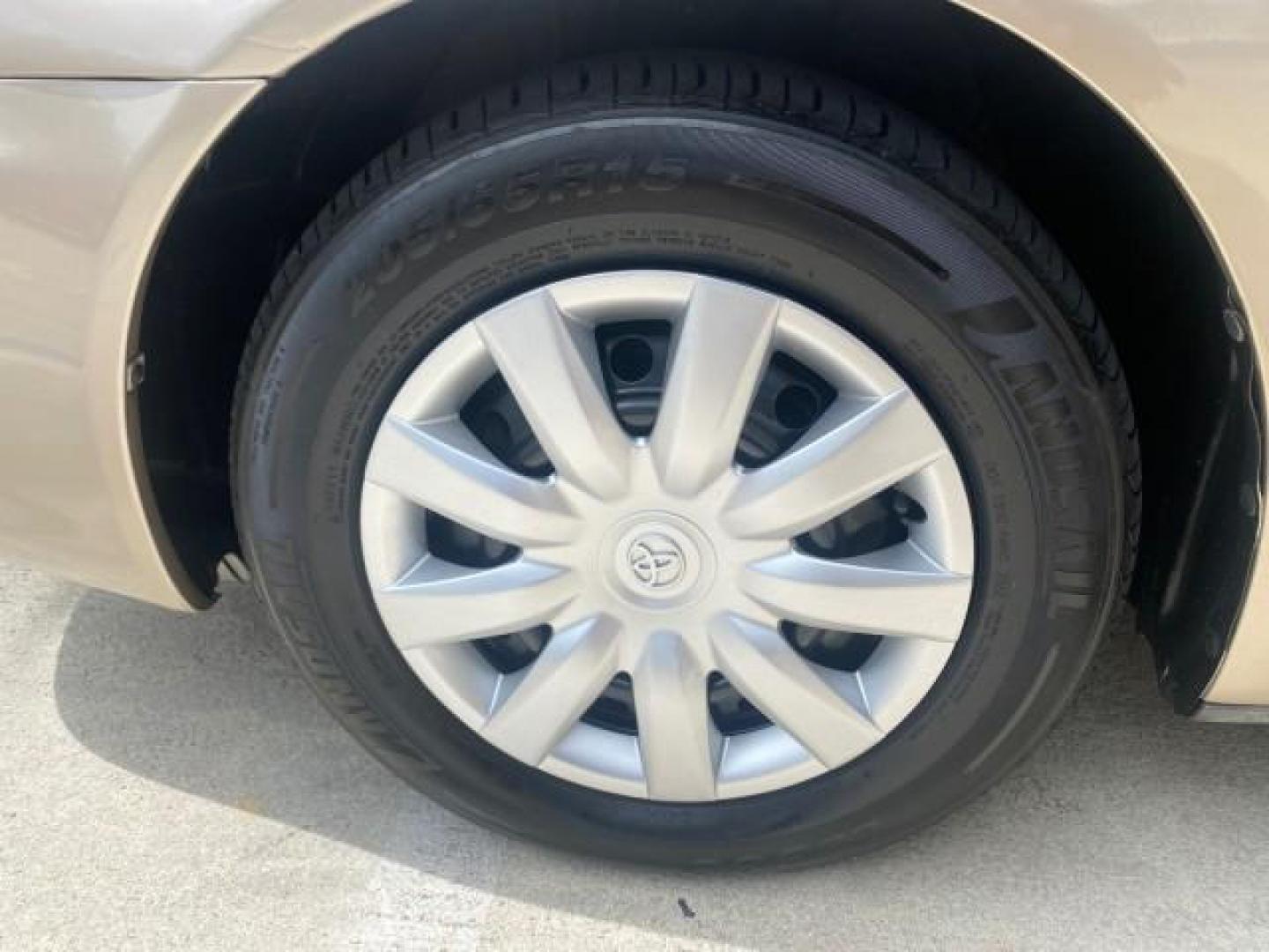 2005 Desert Sand Mica /Stone Toyota Camry LE LOW MILES 57,170 1 FLORIDA (4T1BE32KX5U) with an 2.4L DOHC SEFI Vvti 16-Valve 4-Cyl Engine engine, Automatic transmission, located at 4701 North Dixie Hwy, Pompano Beach, FL, 33064, (954) 422-2889, 26.240938, -80.123474 - OUR WEBPAGE FLORIDACARS1.COM HAS OVER 100 PHOTOS AND FREE CARFAX LINK 2005 TOYOTA CAMRY LE AUTO AC VIN: 4T1BE32KX5U991049 4 T 1 B E 3 2 K X 5 U 9 9 1 0 4 9 SEDAN 4 DR 2.4L I4 F DOHC 16V 34 MPG GASOLINE FRONT WHEEL DRIVE Top Features Cloth Seats Basic Features ABS Brakes Automatic Transmission Power - Photo#19