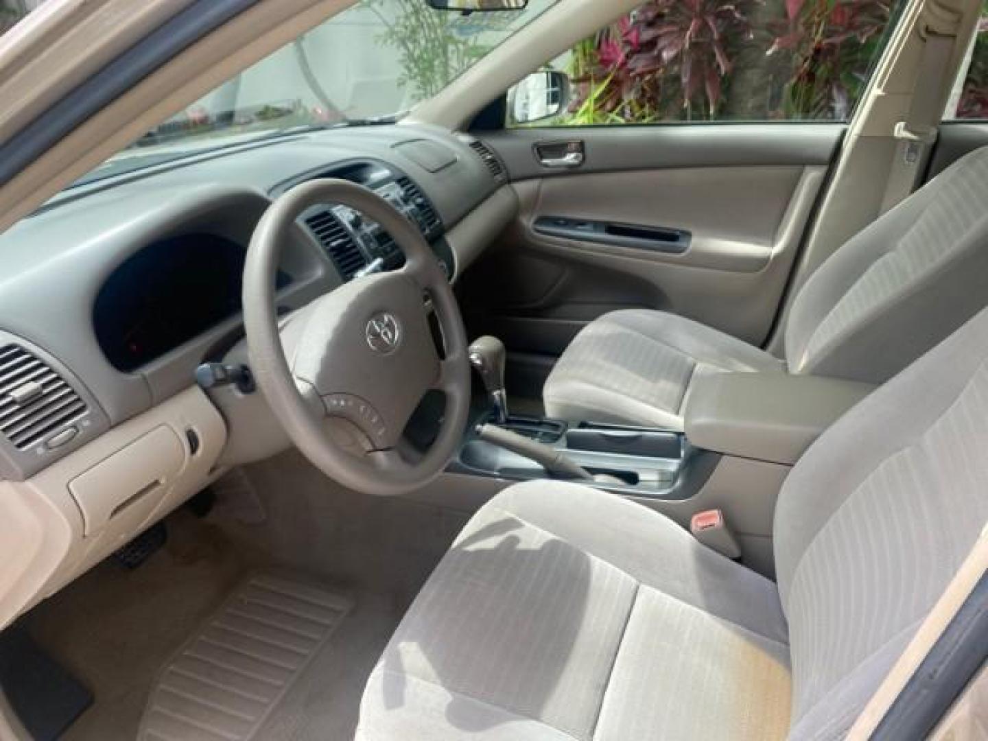 2005 Desert Sand Mica /Stone Toyota Camry LE LOW MILES 57,170 1 FLORIDA (4T1BE32KX5U) with an 2.4L DOHC SEFI Vvti 16-Valve 4-Cyl Engine engine, Automatic transmission, located at 4701 North Dixie Hwy, Pompano Beach, FL, 33064, (954) 422-2889, 26.240938, -80.123474 - OUR WEBPAGE FLORIDACARS1.COM HAS OVER 100 PHOTOS AND FREE CARFAX LINK 2005 TOYOTA CAMRY LE AUTO AC VIN: 4T1BE32KX5U991049 4 T 1 B E 3 2 K X 5 U 9 9 1 0 4 9 SEDAN 4 DR 2.4L I4 F DOHC 16V 34 MPG GASOLINE FRONT WHEEL DRIVE Top Features Cloth Seats Basic Features ABS Brakes Automatic Transmission Power - Photo#35