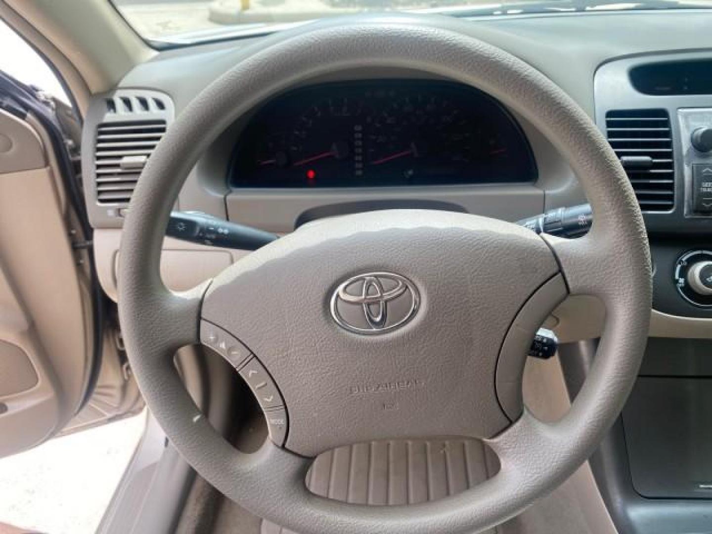 2005 Desert Sand Mica /Stone Toyota Camry LE LOW MILES 57,170 1 FLORIDA (4T1BE32KX5U) with an 2.4L DOHC SEFI Vvti 16-Valve 4-Cyl Engine engine, Automatic transmission, located at 4701 North Dixie Hwy, Pompano Beach, FL, 33064, (954) 422-2889, 26.240938, -80.123474 - OUR WEBPAGE FLORIDACARS1.COM HAS OVER 100 PHOTOS AND FREE CARFAX LINK 2005 TOYOTA CAMRY LE AUTO AC VIN: 4T1BE32KX5U991049 4 T 1 B E 3 2 K X 5 U 9 9 1 0 4 9 SEDAN 4 DR 2.4L I4 F DOHC 16V 34 MPG GASOLINE FRONT WHEEL DRIVE Top Features Cloth Seats Basic Features ABS Brakes Automatic Transmission Power - Photo#36
