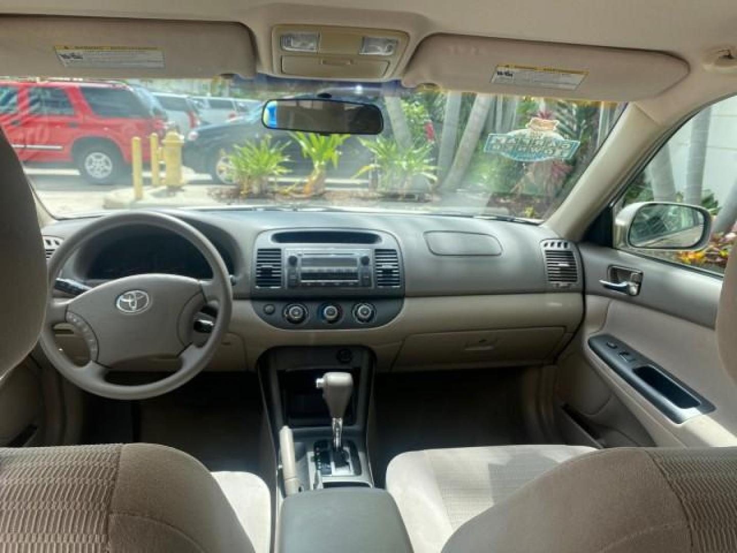 2005 Desert Sand Mica /Stone Toyota Camry LE LOW MILES 57,170 1 FLORIDA (4T1BE32KX5U) with an 2.4L DOHC SEFI Vvti 16-Valve 4-Cyl Engine engine, Automatic transmission, located at 4701 North Dixie Hwy, Pompano Beach, FL, 33064, (954) 422-2889, 26.240938, -80.123474 - OUR WEBPAGE FLORIDACARS1.COM HAS OVER 100 PHOTOS AND FREE CARFAX LINK 2005 TOYOTA CAMRY LE AUTO AC VIN: 4T1BE32KX5U991049 4 T 1 B E 3 2 K X 5 U 9 9 1 0 4 9 SEDAN 4 DR 2.4L I4 F DOHC 16V 34 MPG GASOLINE FRONT WHEEL DRIVE Top Features Cloth Seats Basic Features ABS Brakes Automatic Transmission Power - Photo#69