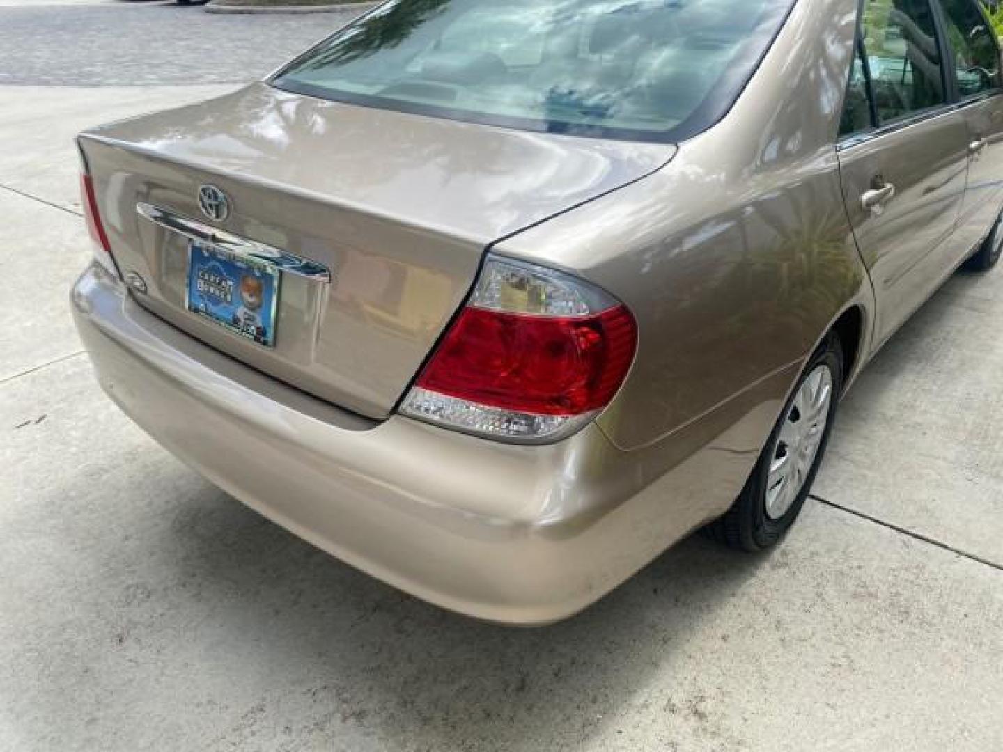 2005 Desert Sand Mica /Stone Toyota Camry LE LOW MILES 57,170 1 FLORIDA (4T1BE32KX5U) with an 2.4L DOHC SEFI Vvti 16-Valve 4-Cyl Engine engine, Automatic transmission, located at 4701 North Dixie Hwy, Pompano Beach, FL, 33064, (954) 422-2889, 26.240938, -80.123474 - OUR WEBPAGE FLORIDACARS1.COM HAS OVER 100 PHOTOS AND FREE CARFAX LINK 2005 TOYOTA CAMRY LE AUTO AC VIN: 4T1BE32KX5U991049 4 T 1 B E 3 2 K X 5 U 9 9 1 0 4 9 SEDAN 4 DR 2.4L I4 F DOHC 16V 34 MPG GASOLINE FRONT WHEEL DRIVE Top Features Cloth Seats Basic Features ABS Brakes Automatic Transmission Power - Photo#78