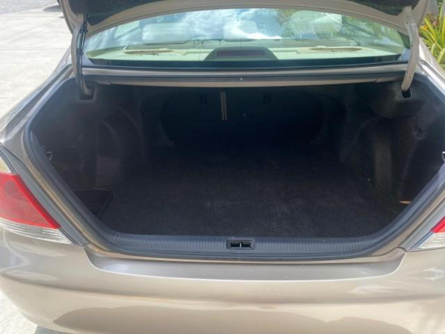 2005 Desert Sand Mica /Stone Toyota Camry LE LOW MILES 57,170 1 FLORIDA (4T1BE32KX5U) with an 2.4L DOHC SEFI Vvti 16-Valve 4-Cyl Engine engine, Automatic transmission, located at 4701 North Dixie Hwy, Pompano Beach, FL, 33064, (954) 422-2889, 26.240938, -80.123474 - OUR WEBPAGE FLORIDACARS1.COM HAS OVER 100 PHOTOS AND FREE CARFAX LINK 2005 TOYOTA CAMRY LE AUTO AC VIN: 4T1BE32KX5U991049 4 T 1 B E 3 2 K X 5 U 9 9 1 0 4 9 SEDAN 4 DR 2.4L I4 F DOHC 16V 34 MPG GASOLINE FRONT WHEEL DRIVE Top Features Cloth Seats Basic Features ABS Brakes Automatic Transmission Power - Photo#80