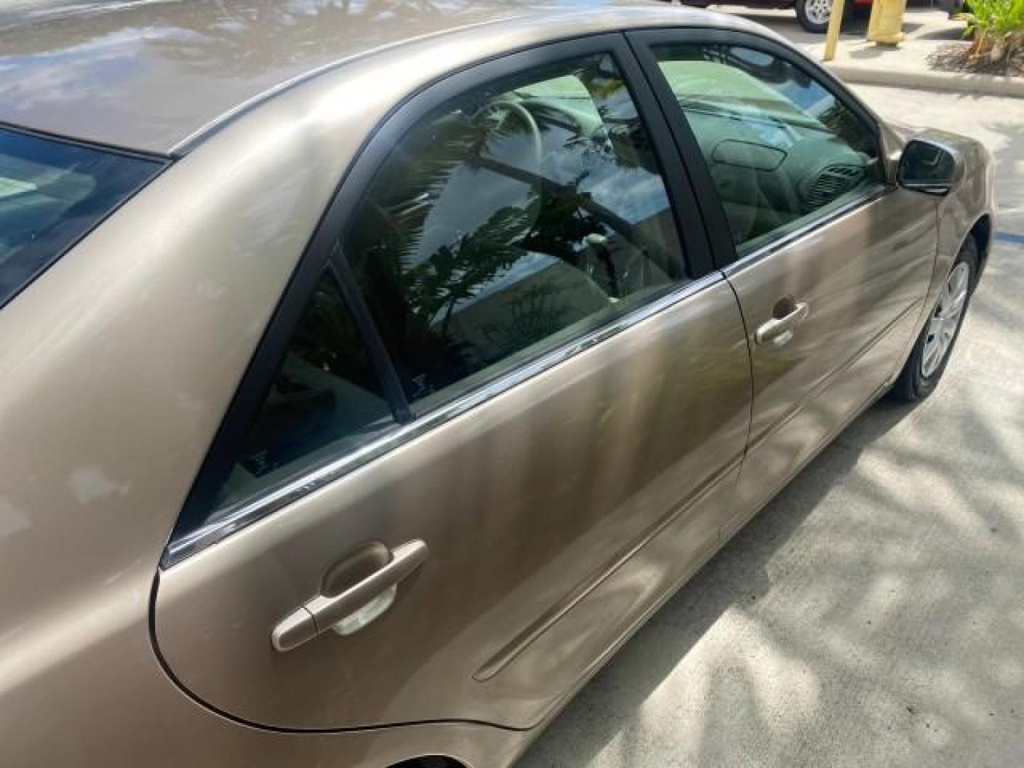 2005 Desert Sand Mica /Stone Toyota Camry LE LOW MILES 57,170 1 FLORIDA (4T1BE32KX5U) with an 2.4L DOHC SEFI Vvti 16-Valve 4-Cyl Engine engine, Automatic transmission, located at 4701 North Dixie Hwy, Pompano Beach, FL, 33064, (954) 422-2889, 26.240938, -80.123474 - OUR WEBPAGE FLORIDACARS1.COM HAS OVER 100 PHOTOS AND FREE CARFAX LINK 2005 TOYOTA CAMRY LE AUTO AC VIN: 4T1BE32KX5U991049 4 T 1 B E 3 2 K X 5 U 9 9 1 0 4 9 SEDAN 4 DR 2.4L I4 F DOHC 16V 34 MPG GASOLINE FRONT WHEEL DRIVE Top Features Cloth Seats Basic Features ABS Brakes Automatic Transmission Power - Photo#85