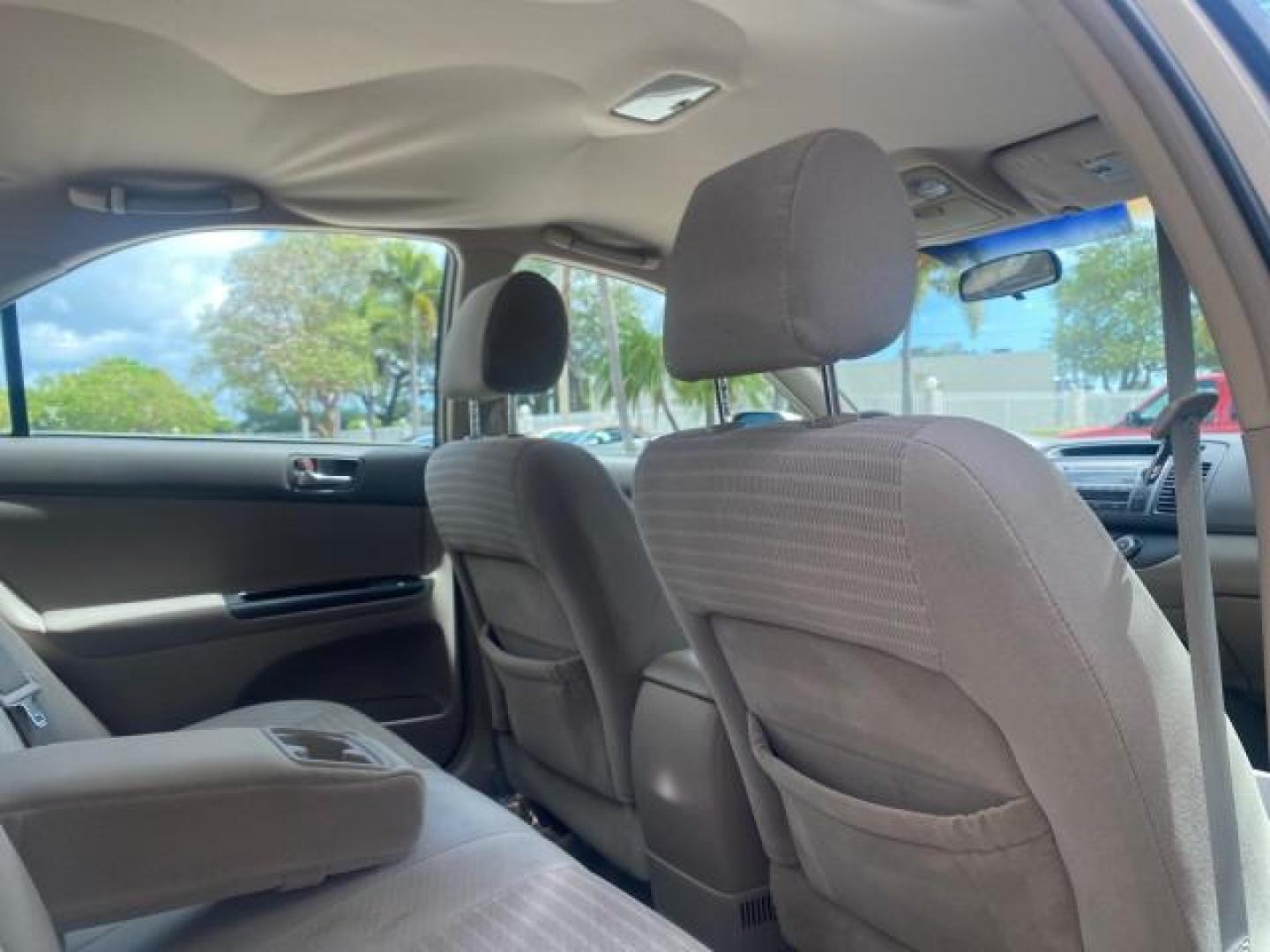 2005 Desert Sand Mica /Stone Toyota Camry LE LOW MILES 57,170 1 FLORIDA (4T1BE32KX5U) with an 2.4L DOHC SEFI Vvti 16-Valve 4-Cyl Engine engine, Automatic transmission, located at 4701 North Dixie Hwy, Pompano Beach, FL, 33064, (954) 422-2889, 26.240938, -80.123474 - OUR WEBPAGE FLORIDACARS1.COM HAS OVER 100 PHOTOS AND FREE CARFAX LINK 2005 TOYOTA CAMRY LE AUTO AC VIN: 4T1BE32KX5U991049 4 T 1 B E 3 2 K X 5 U 9 9 1 0 4 9 SEDAN 4 DR 2.4L I4 F DOHC 16V 34 MPG GASOLINE FRONT WHEEL DRIVE Top Features Cloth Seats Basic Features ABS Brakes Automatic Transmission Power - Photo#87