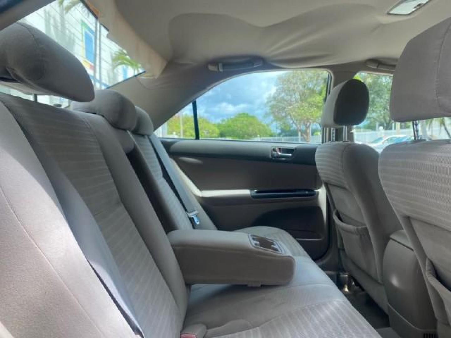 2005 Desert Sand Mica /Stone Toyota Camry LE LOW MILES 57,170 1 FLORIDA (4T1BE32KX5U) with an 2.4L DOHC SEFI Vvti 16-Valve 4-Cyl Engine engine, Automatic transmission, located at 4701 North Dixie Hwy, Pompano Beach, FL, 33064, (954) 422-2889, 26.240938, -80.123474 - OUR WEBPAGE FLORIDACARS1.COM HAS OVER 100 PHOTOS AND FREE CARFAX LINK 2005 TOYOTA CAMRY LE AUTO AC VIN: 4T1BE32KX5U991049 4 T 1 B E 3 2 K X 5 U 9 9 1 0 4 9 SEDAN 4 DR 2.4L I4 F DOHC 16V 34 MPG GASOLINE FRONT WHEEL DRIVE Top Features Cloth Seats Basic Features ABS Brakes Automatic Transmission Power - Photo#88