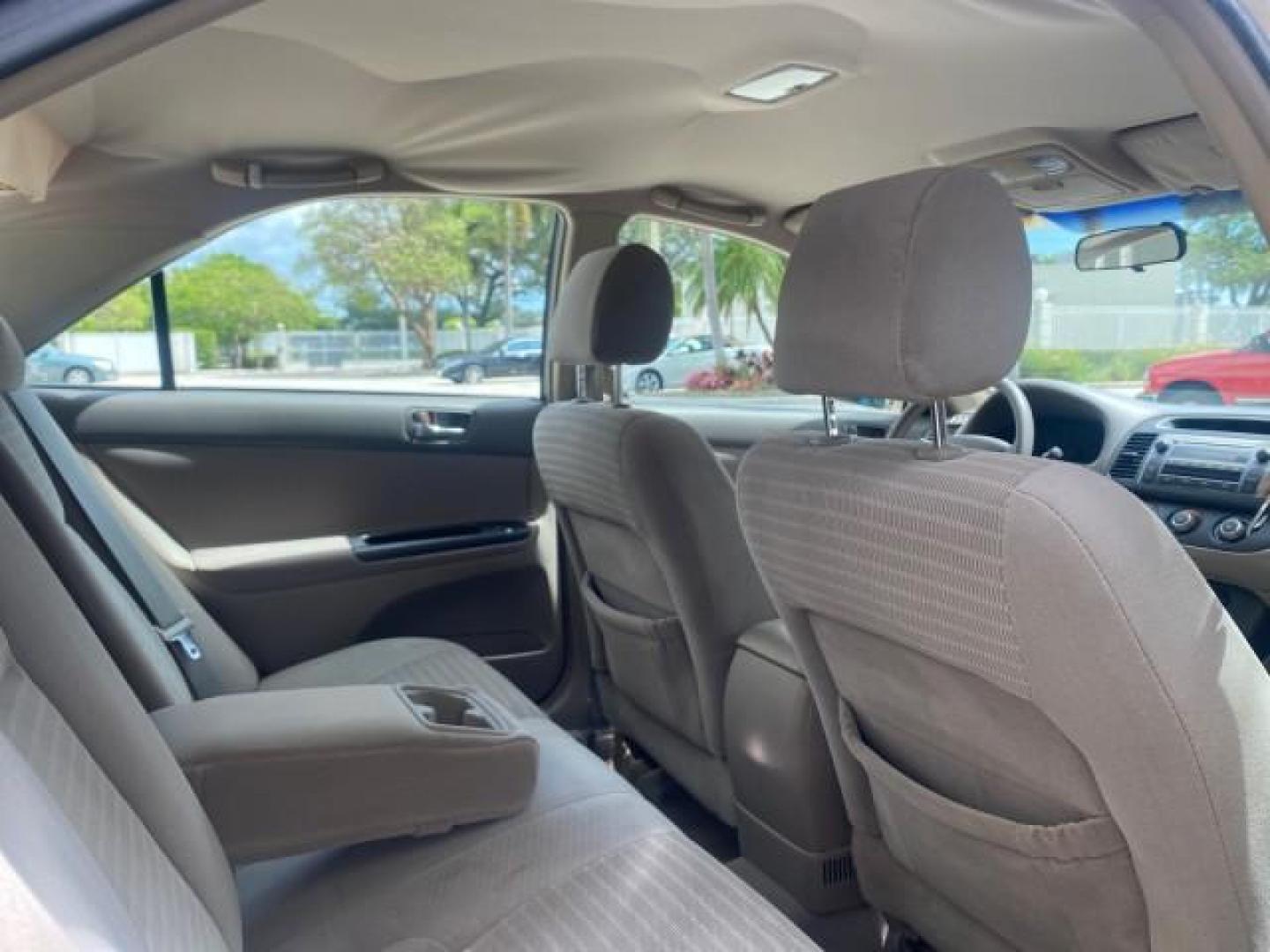 2005 Desert Sand Mica /Stone Toyota Camry LE LOW MILES 57,170 1 FLORIDA (4T1BE32KX5U) with an 2.4L DOHC SEFI Vvti 16-Valve 4-Cyl Engine engine, Automatic transmission, located at 4701 North Dixie Hwy, Pompano Beach, FL, 33064, (954) 422-2889, 26.240938, -80.123474 - OUR WEBPAGE FLORIDACARS1.COM HAS OVER 100 PHOTOS AND FREE CARFAX LINK 2005 TOYOTA CAMRY LE AUTO AC VIN: 4T1BE32KX5U991049 4 T 1 B E 3 2 K X 5 U 9 9 1 0 4 9 SEDAN 4 DR 2.4L I4 F DOHC 16V 34 MPG GASOLINE FRONT WHEEL DRIVE Top Features Cloth Seats Basic Features ABS Brakes Automatic Transmission Power - Photo#89