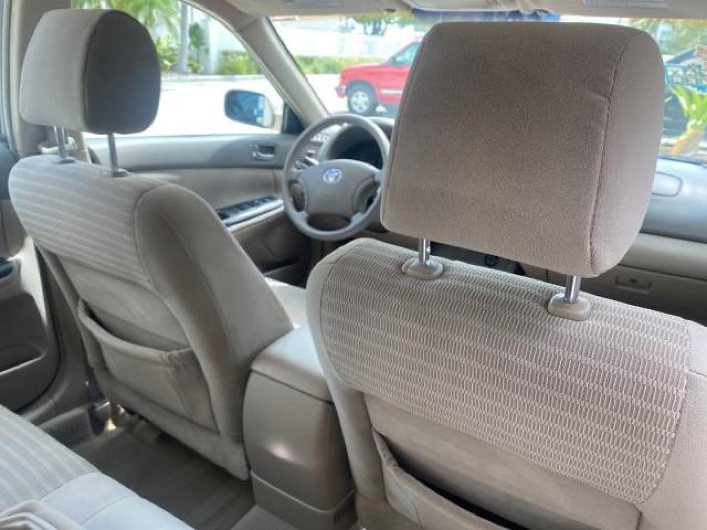 2005 Desert Sand Mica /Stone Toyota Camry LE LOW MILES 57,170 1 FLORIDA (4T1BE32KX5U) with an 2.4L DOHC SEFI Vvti 16-Valve 4-Cyl Engine engine, Automatic transmission, located at 4701 North Dixie Hwy, Pompano Beach, FL, 33064, (954) 422-2889, 26.240938, -80.123474 - OUR WEBPAGE FLORIDACARS1.COM HAS OVER 100 PHOTOS AND FREE CARFAX LINK 2005 TOYOTA CAMRY LE AUTO AC VIN: 4T1BE32KX5U991049 4 T 1 B E 3 2 K X 5 U 9 9 1 0 4 9 SEDAN 4 DR 2.4L I4 F DOHC 16V 34 MPG GASOLINE FRONT WHEEL DRIVE Top Features Cloth Seats Basic Features ABS Brakes Automatic Transmission Power - Photo#90
