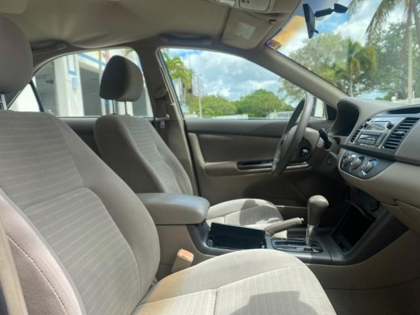 2005 Desert Sand Mica /Stone Toyota Camry LE LOW MILES 57,170 1 FLORIDA (4T1BE32KX5U) with an 2.4L DOHC SEFI Vvti 16-Valve 4-Cyl Engine engine, Automatic transmission, located at 4701 North Dixie Hwy, Pompano Beach, FL, 33064, (954) 422-2889, 26.240938, -80.123474 - OUR WEBPAGE FLORIDACARS1.COM HAS OVER 100 PHOTOS AND FREE CARFAX LINK 2005 TOYOTA CAMRY LE AUTO AC VIN: 4T1BE32KX5U991049 4 T 1 B E 3 2 K X 5 U 9 9 1 0 4 9 SEDAN 4 DR 2.4L I4 F DOHC 16V 34 MPG GASOLINE FRONT WHEEL DRIVE Top Features Cloth Seats Basic Features ABS Brakes Automatic Transmission Power - Photo#95