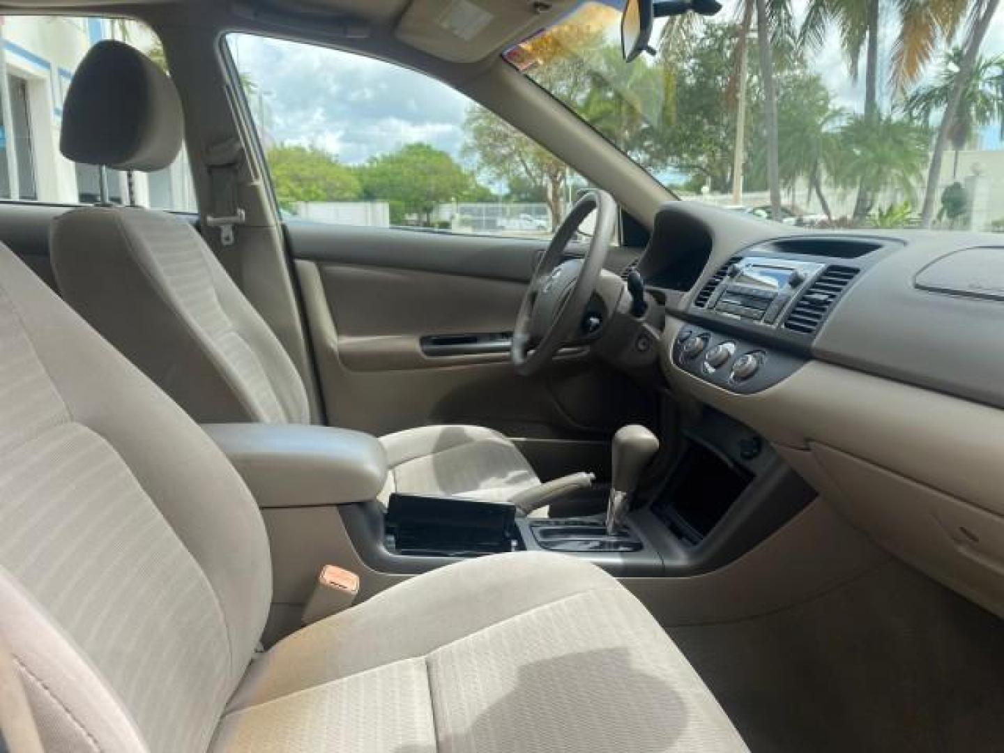 2005 Desert Sand Mica /Stone Toyota Camry LE LOW MILES 57,170 1 FLORIDA (4T1BE32KX5U) with an 2.4L DOHC SEFI Vvti 16-Valve 4-Cyl Engine engine, Automatic transmission, located at 4701 North Dixie Hwy, Pompano Beach, FL, 33064, (954) 422-2889, 26.240938, -80.123474 - OUR WEBPAGE FLORIDACARS1.COM HAS OVER 100 PHOTOS AND FREE CARFAX LINK 2005 TOYOTA CAMRY LE AUTO AC VIN: 4T1BE32KX5U991049 4 T 1 B E 3 2 K X 5 U 9 9 1 0 4 9 SEDAN 4 DR 2.4L I4 F DOHC 16V 34 MPG GASOLINE FRONT WHEEL DRIVE Top Features Cloth Seats Basic Features ABS Brakes Automatic Transmission Power - Photo#96