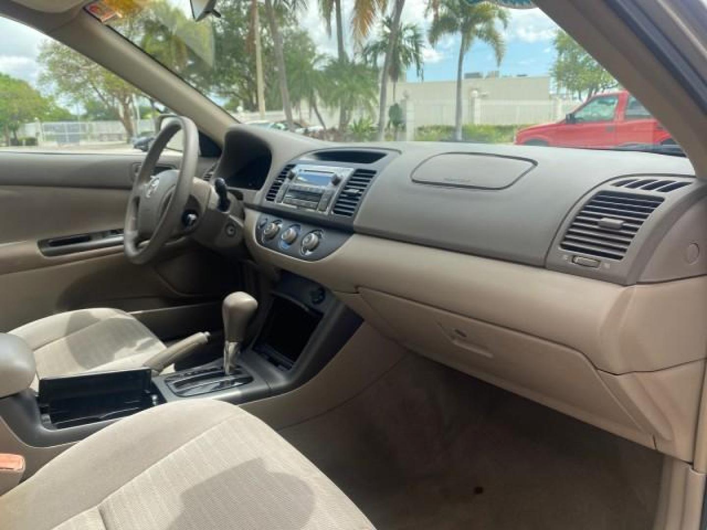 2005 Desert Sand Mica /Stone Toyota Camry LE LOW MILES 57,170 1 FLORIDA (4T1BE32KX5U) with an 2.4L DOHC SEFI Vvti 16-Valve 4-Cyl Engine engine, Automatic transmission, located at 4701 North Dixie Hwy, Pompano Beach, FL, 33064, (954) 422-2889, 26.240938, -80.123474 - OUR WEBPAGE FLORIDACARS1.COM HAS OVER 100 PHOTOS AND FREE CARFAX LINK 2005 TOYOTA CAMRY LE AUTO AC VIN: 4T1BE32KX5U991049 4 T 1 B E 3 2 K X 5 U 9 9 1 0 4 9 SEDAN 4 DR 2.4L I4 F DOHC 16V 34 MPG GASOLINE FRONT WHEEL DRIVE Top Features Cloth Seats Basic Features ABS Brakes Automatic Transmission Power - Photo#97