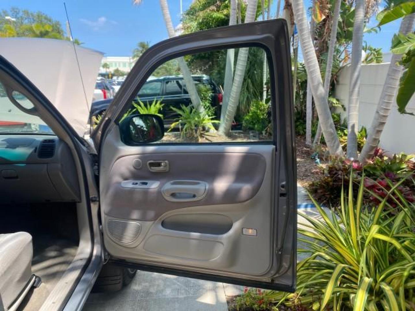 2002 Thunder Grey Metallic /Gray Toyota Tundra SR5 1 OWNER FLORIDA 4X4 (5TBBT44102S) with an 4.7L DOHC EFI 32-Valve V8 i-Force Engine engine, Automatic transmission, located at 4701 North Dixie Hwy, Pompano Beach, FL, 33064, (954) 422-2889, 26.240938, -80.123474 - OUR WEBPAGE FLORIDACARS1.COM HAS OVER 100 PHOTOS AND FREE CARFAX LINK 2002 TOYOTA TUNDRA SR5 V8 VIN: 5TBBT44102S289903 5 T B B T 4 4 1 0 2 S 2 8 9 9 0 3 4 DOOR EXTENDED CAB PICKUP 4 DR 4.7L V8 F DOHC 32V GASOLINE REAR WHEEL DRIVE W/ 4X4 Top Features 4WD/AWD Cloth Seats Alloy Wheels Tow Hitch Bed Lin - Photo#11