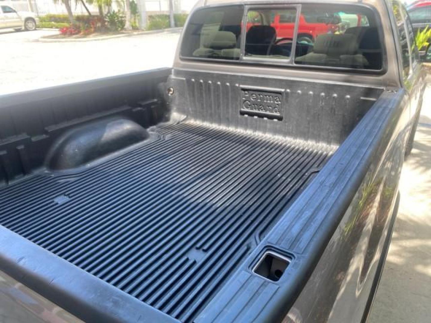 2002 Thunder Grey Metallic /Gray Toyota Tundra SR5 1 OWNER FLORIDA 4X4 (5TBBT44102S) with an 4.7L DOHC EFI 32-Valve V8 i-Force Engine engine, Automatic transmission, located at 4701 North Dixie Hwy, Pompano Beach, FL, 33064, (954) 422-2889, 26.240938, -80.123474 - OUR WEBPAGE FLORIDACARS1.COM HAS OVER 100 PHOTOS AND FREE CARFAX LINK 2002 TOYOTA TUNDRA SR5 V8 VIN: 5TBBT44102S289903 5 T B B T 4 4 1 0 2 S 2 8 9 9 0 3 4 DOOR EXTENDED CAB PICKUP 4 DR 4.7L V8 F DOHC 32V GASOLINE REAR WHEEL DRIVE W/ 4X4 Top Features 4WD/AWD Cloth Seats Alloy Wheels Tow Hitch Bed Lin - Photo#88