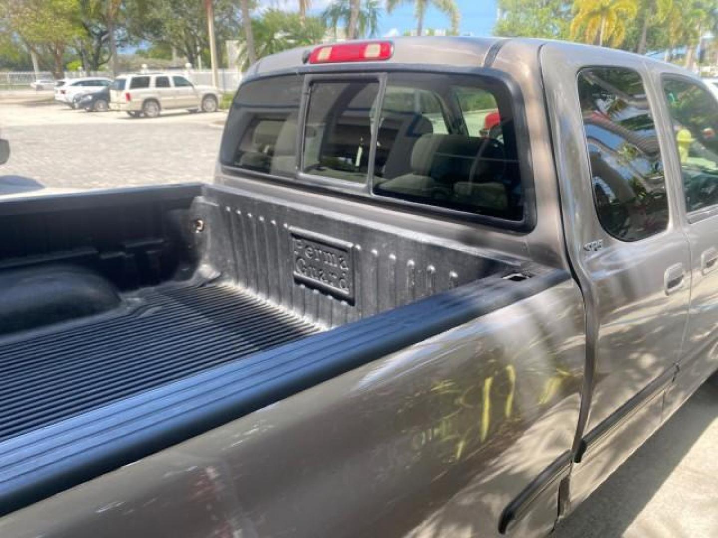 2002 Thunder Grey Metallic /Gray Toyota Tundra SR5 1 OWNER FLORIDA 4X4 (5TBBT44102S) with an 4.7L DOHC EFI 32-Valve V8 i-Force Engine engine, Automatic transmission, located at 4701 North Dixie Hwy, Pompano Beach, FL, 33064, (954) 422-2889, 26.240938, -80.123474 - OUR WEBPAGE FLORIDACARS1.COM HAS OVER 100 PHOTOS AND FREE CARFAX LINK 2002 TOYOTA TUNDRA SR5 V8 VIN: 5TBBT44102S289903 5 T B B T 4 4 1 0 2 S 2 8 9 9 0 3 4 DOOR EXTENDED CAB PICKUP 4 DR 4.7L V8 F DOHC 32V GASOLINE REAR WHEEL DRIVE W/ 4X4 Top Features 4WD/AWD Cloth Seats Alloy Wheels Tow Hitch Bed Lin - Photo#92