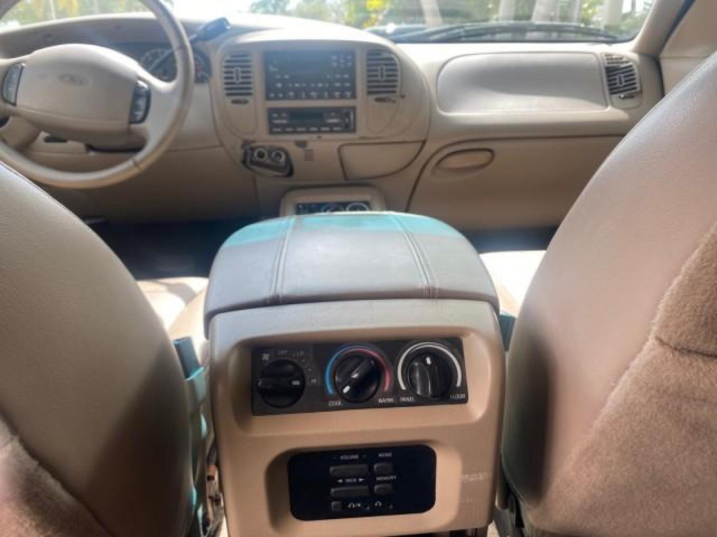 2001 Oxford White /Med Parchment Ford Expedition Eddie Bauer LOW MILES 97,648 (1FMRU17W91L) with an 4.6L SOHC SEFI V8 Triton Engine engine, Automatic transmission, located at 4701 North Dixie Hwy, Pompano Beach, FL, 33064, (954) 422-2889, 26.240938, -80.123474 - OUR WEBPAGE FLORIDACARS1.COM HAS OVER 100 PHOTOS AND FREE CARFAX LINK 2001 FORD EXPEDITION EDDIE BAUER VIN: 1FMRU17W91LB77217 1 F M R U 1 7 W 9 1 L B 7 7 2 1 7 4 DOOR WAGON/SPORT UTILITY 4.6L V8 F SOHC 16V GASOLINE REAR WHEEL DRIVE Highlighted Features Tow Hitch Power Windows Power Locks Automatic T - Photo#69
