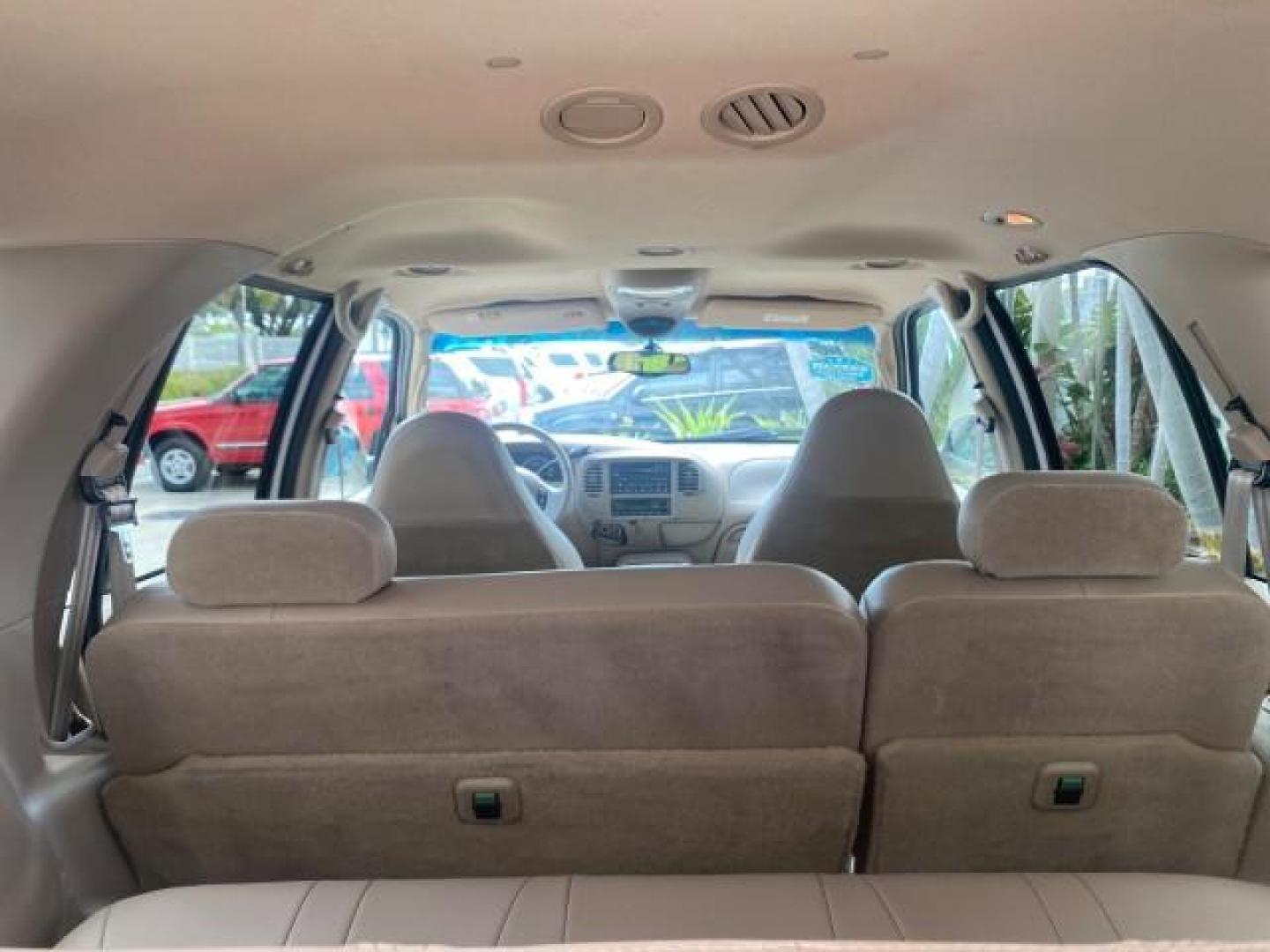2001 Oxford White /Med Parchment Ford Expedition Eddie Bauer LOW MILES 97,648 (1FMRU17W91L) with an 4.6L SOHC SEFI V8 Triton Engine engine, Automatic transmission, located at 4701 North Dixie Hwy, Pompano Beach, FL, 33064, (954) 422-2889, 26.240938, -80.123474 - OUR WEBPAGE FLORIDACARS1.COM HAS OVER 100 PHOTOS AND FREE CARFAX LINK 2001 FORD EXPEDITION EDDIE BAUER VIN: 1FMRU17W91LB77217 1 F M R U 1 7 W 9 1 L B 7 7 2 1 7 4 DOOR WAGON/SPORT UTILITY 4.6L V8 F SOHC 16V GASOLINE REAR WHEEL DRIVE Highlighted Features Tow Hitch Power Windows Power Locks Automatic T - Photo#88