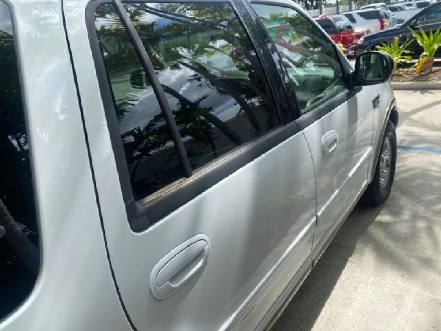 2001 Oxford White /Med Parchment Ford Expedition Eddie Bauer LOW MILES 97,648 (1FMRU17W91L) with an 4.6L SOHC SEFI V8 Triton Engine engine, Automatic transmission, located at 4701 North Dixie Hwy, Pompano Beach, FL, 33064, (954) 422-2889, 26.240938, -80.123474 - OUR WEBPAGE FLORIDACARS1.COM HAS OVER 100 PHOTOS AND FREE CARFAX LINK 2001 FORD EXPEDITION EDDIE BAUER VIN: 1FMRU17W91LB77217 1 F M R U 1 7 W 9 1 L B 7 7 2 1 7 4 DOOR WAGON/SPORT UTILITY 4.6L V8 F SOHC 16V GASOLINE REAR WHEEL DRIVE Highlighted Features Tow Hitch Power Windows Power Locks Automatic T - Photo#92