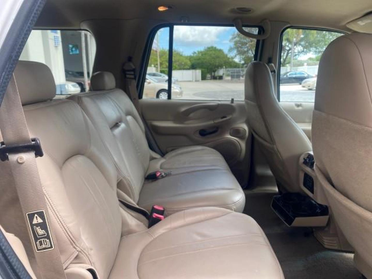 2001 Oxford White /Med Parchment Ford Expedition Eddie Bauer LOW MILES 97,648 (1FMRU17W91L) with an 4.6L SOHC SEFI V8 Triton Engine engine, Automatic transmission, located at 4701 North Dixie Hwy, Pompano Beach, FL, 33064, (954) 422-2889, 26.240938, -80.123474 - OUR WEBPAGE FLORIDACARS1.COM HAS OVER 100 PHOTOS AND FREE CARFAX LINK 2001 FORD EXPEDITION EDDIE BAUER VIN: 1FMRU17W91LB77217 1 F M R U 1 7 W 9 1 L B 7 7 2 1 7 4 DOOR WAGON/SPORT UTILITY 4.6L V8 F SOHC 16V GASOLINE REAR WHEEL DRIVE Highlighted Features Tow Hitch Power Windows Power Locks Automatic T - Photo#95