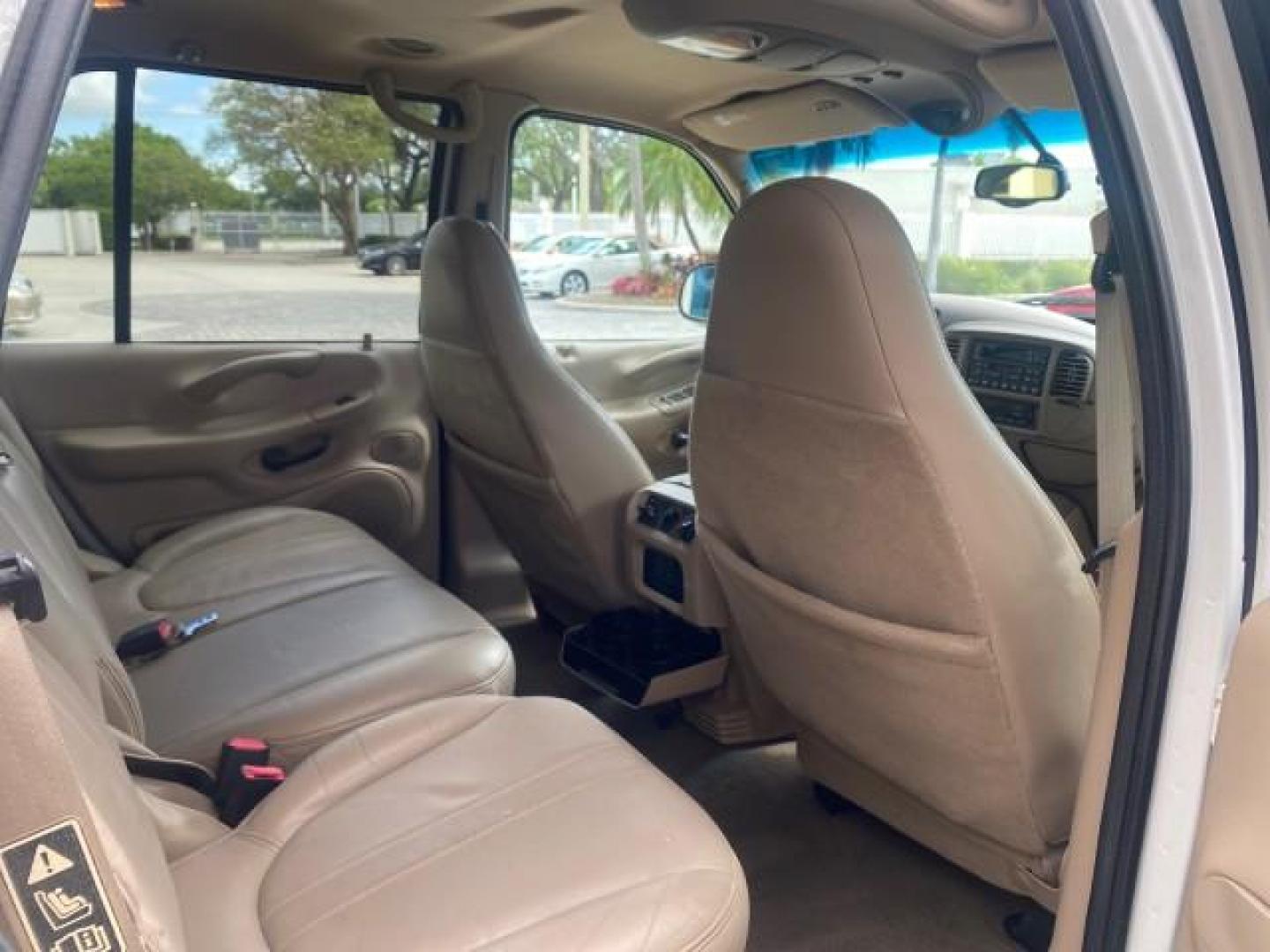2001 Oxford White /Med Parchment Ford Expedition Eddie Bauer LOW MILES 97,648 (1FMRU17W91L) with an 4.6L SOHC SEFI V8 Triton Engine engine, Automatic transmission, located at 4701 North Dixie Hwy, Pompano Beach, FL, 33064, (954) 422-2889, 26.240938, -80.123474 - OUR WEBPAGE FLORIDACARS1.COM HAS OVER 100 PHOTOS AND FREE CARFAX LINK 2001 FORD EXPEDITION EDDIE BAUER VIN: 1FMRU17W91LB77217 1 F M R U 1 7 W 9 1 L B 7 7 2 1 7 4 DOOR WAGON/SPORT UTILITY 4.6L V8 F SOHC 16V GASOLINE REAR WHEEL DRIVE Highlighted Features Tow Hitch Power Windows Power Locks Automatic T - Photo#96
