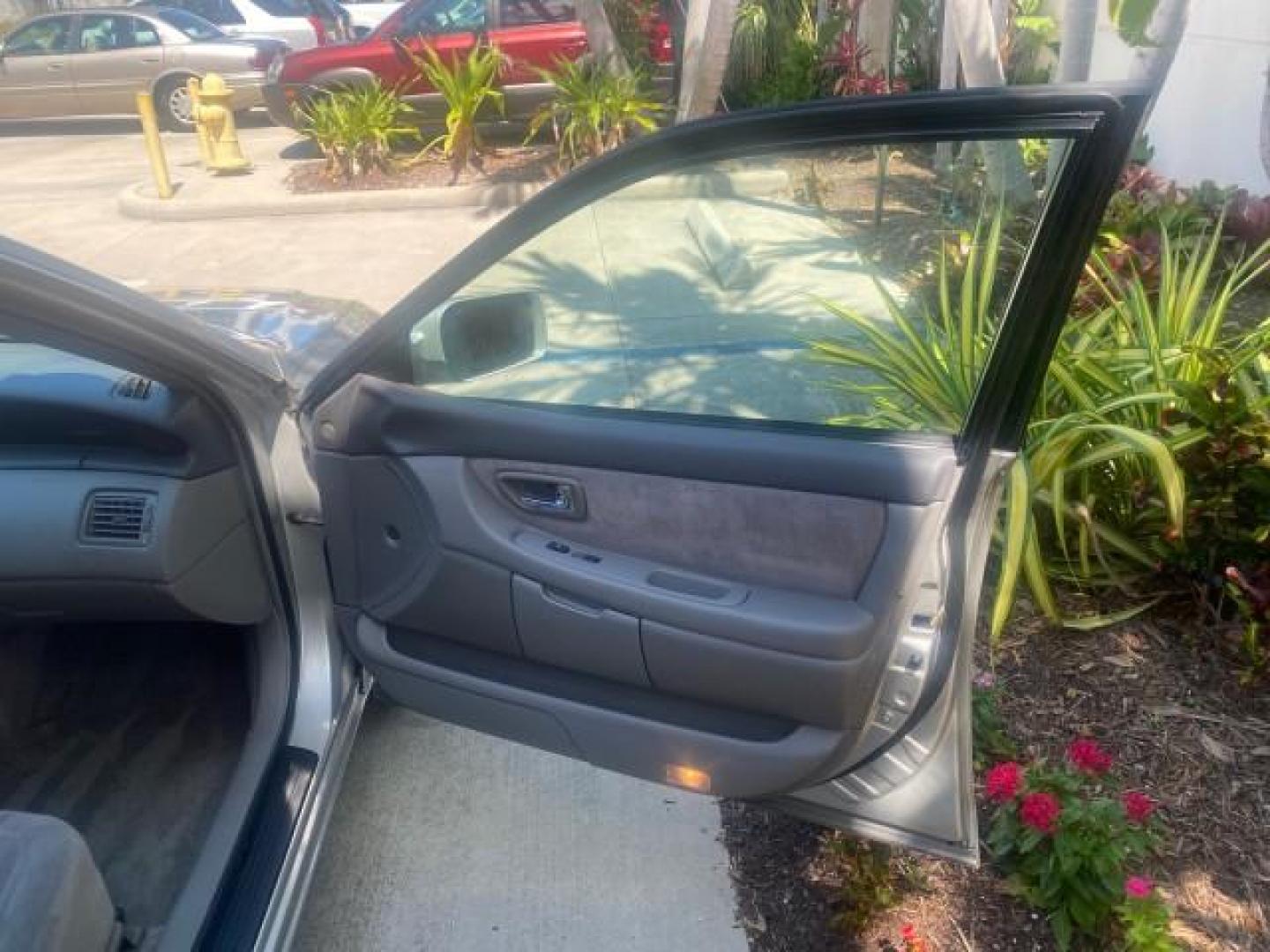 2001 Silver Spruce Metallic /Stone Toyota Avalon XLS w/Bucket Seats LOW MILES 60,208 (4T1BF28B71U) with an 3.0L 4-Cam MPFI 24-Valve V6 Aluminum Alloy Engine engine, Automatic transmission, located at 4701 North Dixie Hwy, Pompano Beach, FL, 33064, (954) 422-2889, 26.240938, -80.123474 - OUR WEBPAGE FLORIDACARS1.COM HAS OVER 100 PHOTOS AND FREE CARFAX LINK 2001 TOYOTA AVALON XL VIN: 4T1BF28B71U182293 4 T 1 B F 2 8 B 7 1 U 1 8 2 2 9 3 SEDAN 4 DR 3.0L V6 F DOHC 24V 29 MPG GASOLINE FRONT WHEEL DRIVE Top Features Alloy Wheels Cloth Seats Basic Features ABS Brakes Automatic Transmission - Photo#11