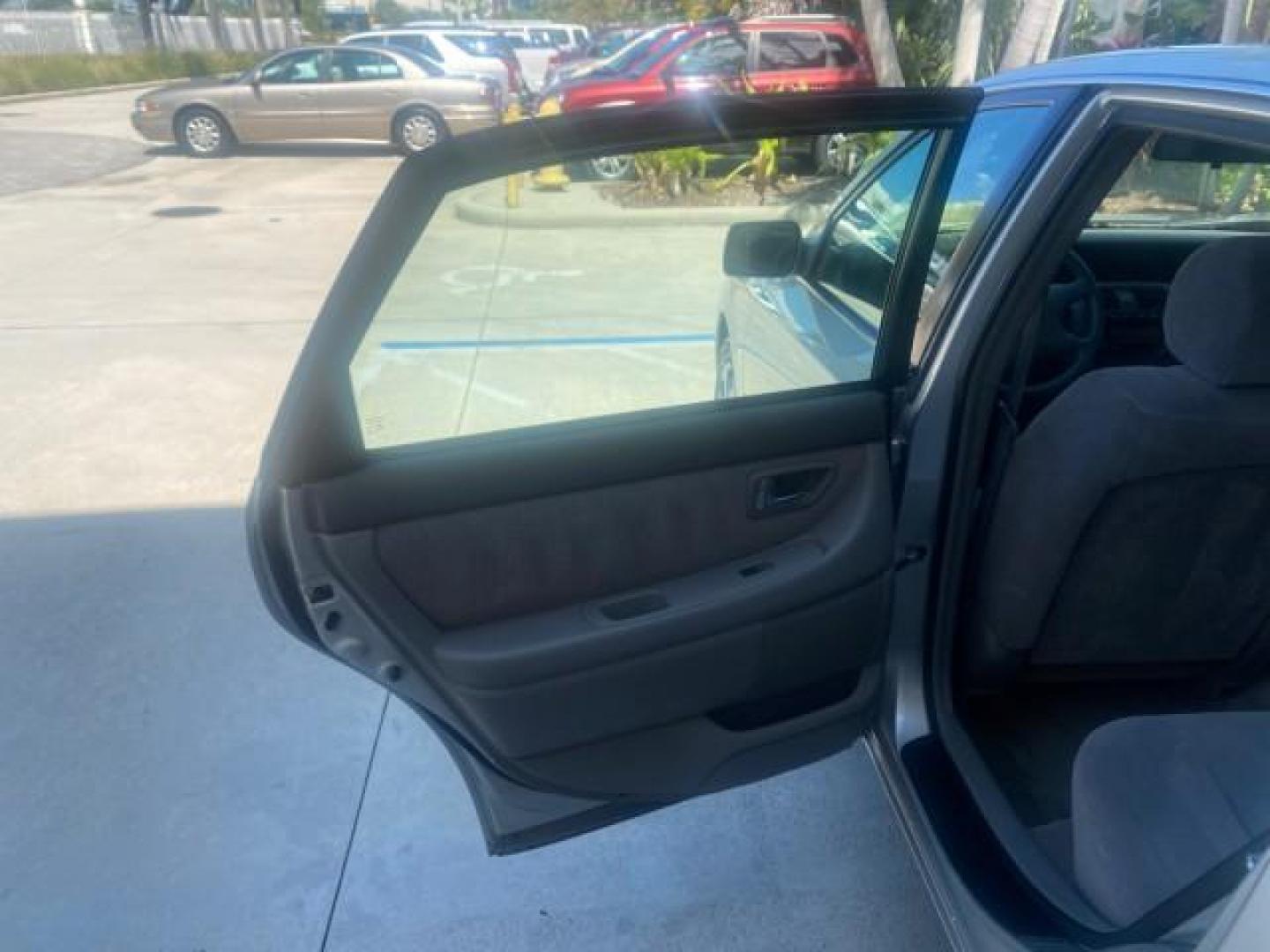 2001 Silver Spruce Metallic /Stone Toyota Avalon XLS w/Bucket Seats LOW MILES 60,208 (4T1BF28B71U) with an 3.0L 4-Cam MPFI 24-Valve V6 Aluminum Alloy Engine engine, Automatic transmission, located at 4701 North Dixie Hwy, Pompano Beach, FL, 33064, (954) 422-2889, 26.240938, -80.123474 - OUR WEBPAGE FLORIDACARS1.COM HAS OVER 100 PHOTOS AND FREE CARFAX LINK 2001 TOYOTA AVALON XL VIN: 4T1BF28B71U182293 4 T 1 B F 2 8 B 7 1 U 1 8 2 2 9 3 SEDAN 4 DR 3.0L V6 F DOHC 24V 29 MPG GASOLINE FRONT WHEEL DRIVE Top Features Alloy Wheels Cloth Seats Basic Features ABS Brakes Automatic Transmission - Photo#13