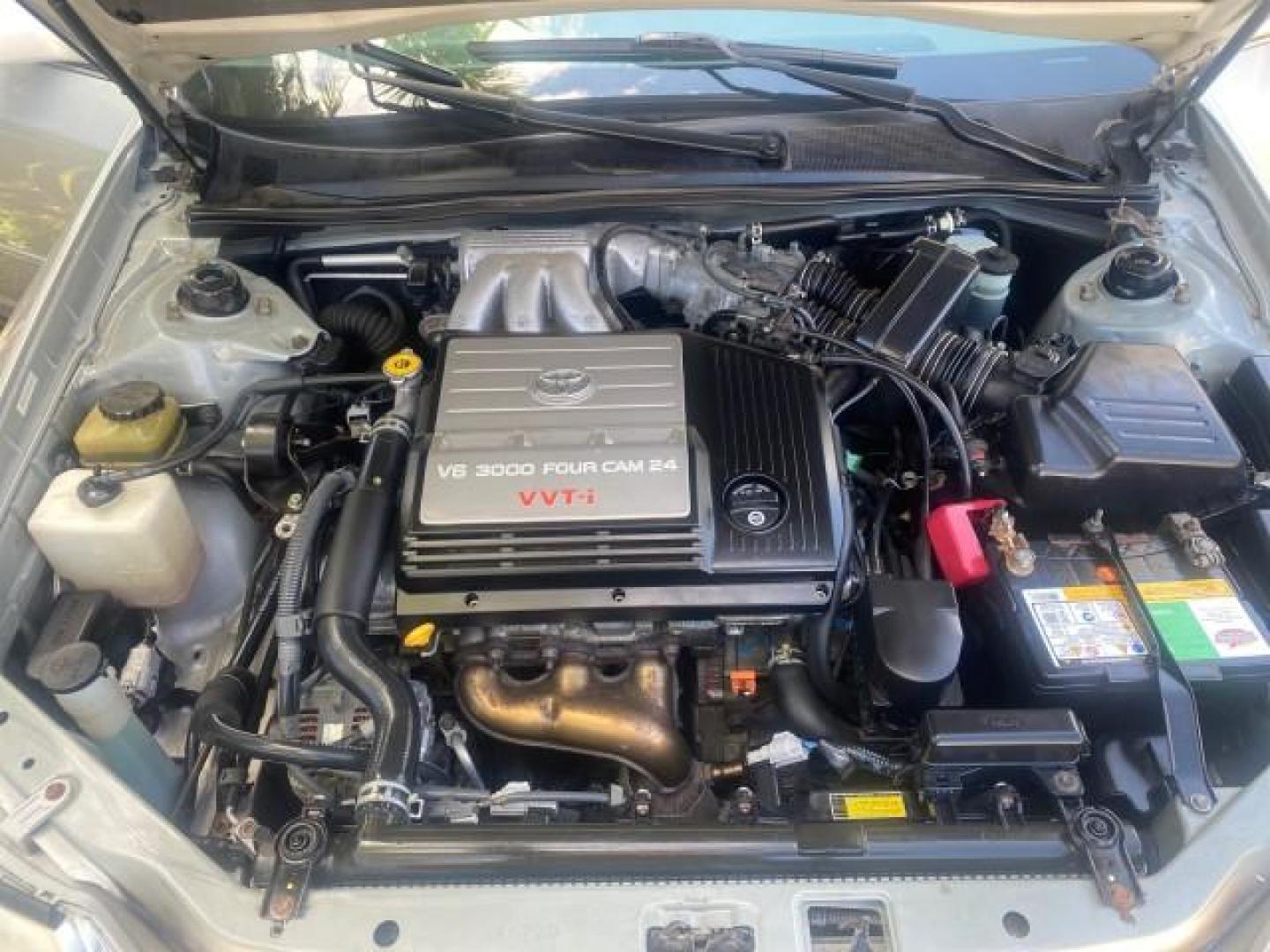 2001 Silver Spruce Metallic /Stone Toyota Avalon XLS w/Bucket Seats LOW MILES 60,208 (4T1BF28B71U) with an 3.0L 4-Cam MPFI 24-Valve V6 Aluminum Alloy Engine engine, Automatic transmission, located at 4701 North Dixie Hwy, Pompano Beach, FL, 33064, (954) 422-2889, 26.240938, -80.123474 - OUR WEBPAGE FLORIDACARS1.COM HAS OVER 100 PHOTOS AND FREE CARFAX LINK 2001 TOYOTA AVALON XL VIN: 4T1BF28B71U182293 4 T 1 B F 2 8 B 7 1 U 1 8 2 2 9 3 SEDAN 4 DR 3.0L V6 F DOHC 24V 29 MPG GASOLINE FRONT WHEEL DRIVE Top Features Alloy Wheels Cloth Seats Basic Features ABS Brakes Automatic Transmission - Photo#17