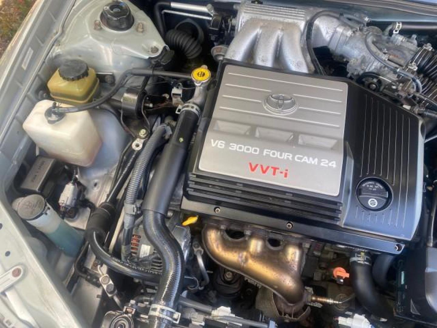 2001 Silver Spruce Metallic /Stone Toyota Avalon XLS w/Bucket Seats LOW MILES 60,208 (4T1BF28B71U) with an 3.0L 4-Cam MPFI 24-Valve V6 Aluminum Alloy Engine engine, Automatic transmission, located at 4701 North Dixie Hwy, Pompano Beach, FL, 33064, (954) 422-2889, 26.240938, -80.123474 - OUR WEBPAGE FLORIDACARS1.COM HAS OVER 100 PHOTOS AND FREE CARFAX LINK 2001 TOYOTA AVALON XL VIN: 4T1BF28B71U182293 4 T 1 B F 2 8 B 7 1 U 1 8 2 2 9 3 SEDAN 4 DR 3.0L V6 F DOHC 24V 29 MPG GASOLINE FRONT WHEEL DRIVE Top Features Alloy Wheels Cloth Seats Basic Features ABS Brakes Automatic Transmission - Photo#24