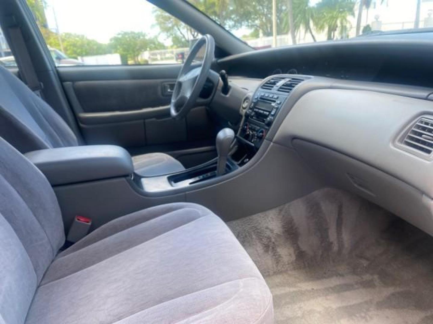 2001 Silver Spruce Metallic /Stone Toyota Avalon XLS w/Bucket Seats LOW MILES 60,208 (4T1BF28B71U) with an 3.0L 4-Cam MPFI 24-Valve V6 Aluminum Alloy Engine engine, Automatic transmission, located at 4701 North Dixie Hwy, Pompano Beach, FL, 33064, (954) 422-2889, 26.240938, -80.123474 - OUR WEBPAGE FLORIDACARS1.COM HAS OVER 100 PHOTOS AND FREE CARFAX LINK 2001 TOYOTA AVALON XL VIN: 4T1BF28B71U182293 4 T 1 B F 2 8 B 7 1 U 1 8 2 2 9 3 SEDAN 4 DR 3.0L V6 F DOHC 24V 29 MPG GASOLINE FRONT WHEEL DRIVE Top Features Alloy Wheels Cloth Seats Basic Features ABS Brakes Automatic Transmission - Photo#92