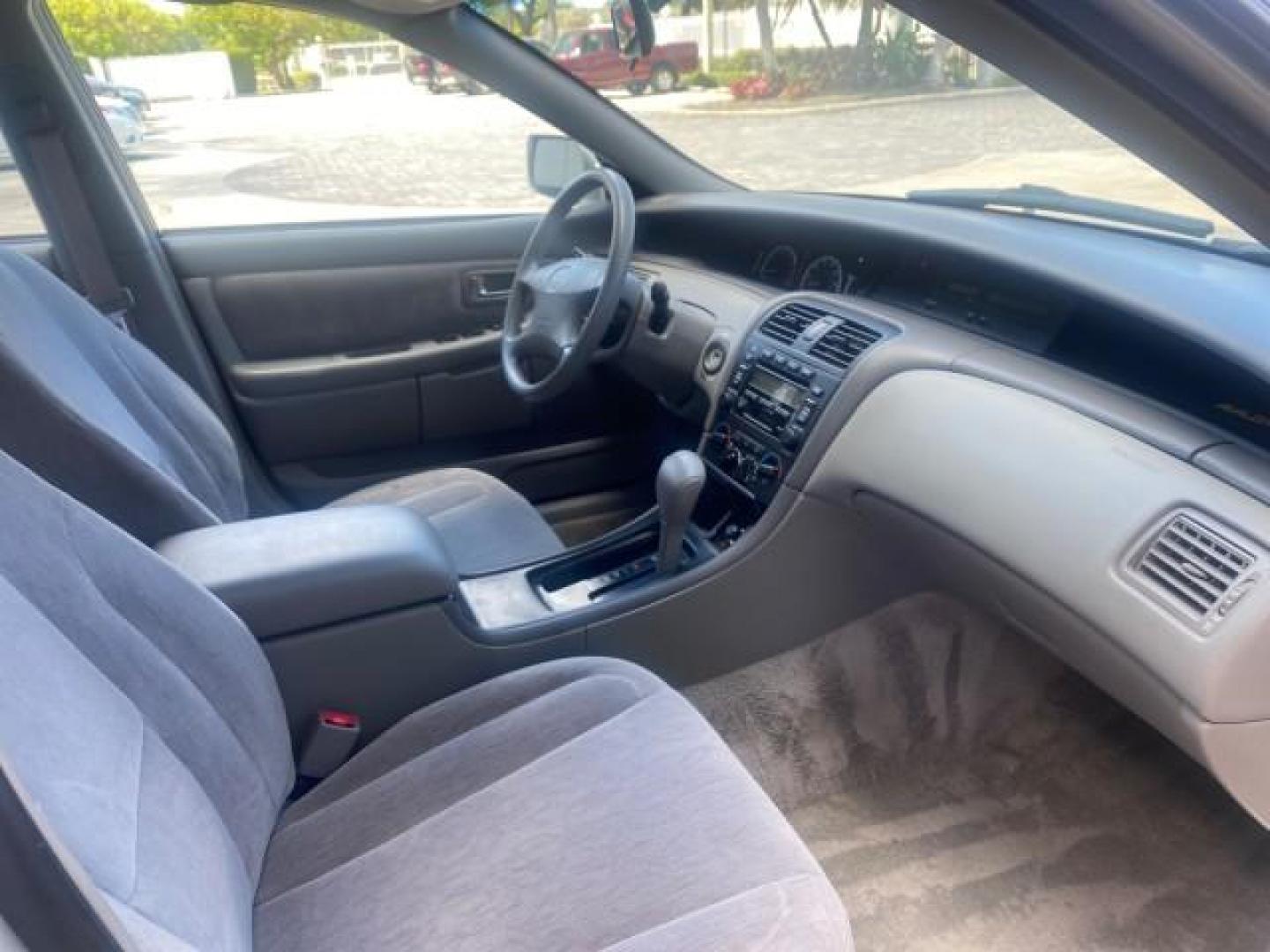 2001 Silver Spruce Metallic /Stone Toyota Avalon XLS w/Bucket Seats LOW MILES 60,208 (4T1BF28B71U) with an 3.0L 4-Cam MPFI 24-Valve V6 Aluminum Alloy Engine engine, Automatic transmission, located at 4701 North Dixie Hwy, Pompano Beach, FL, 33064, (954) 422-2889, 26.240938, -80.123474 - OUR WEBPAGE FLORIDACARS1.COM HAS OVER 100 PHOTOS AND FREE CARFAX LINK 2001 TOYOTA AVALON XL VIN: 4T1BF28B71U182293 4 T 1 B F 2 8 B 7 1 U 1 8 2 2 9 3 SEDAN 4 DR 3.0L V6 F DOHC 24V 29 MPG GASOLINE FRONT WHEEL DRIVE Top Features Alloy Wheels Cloth Seats Basic Features ABS Brakes Automatic Transmission - Photo#94