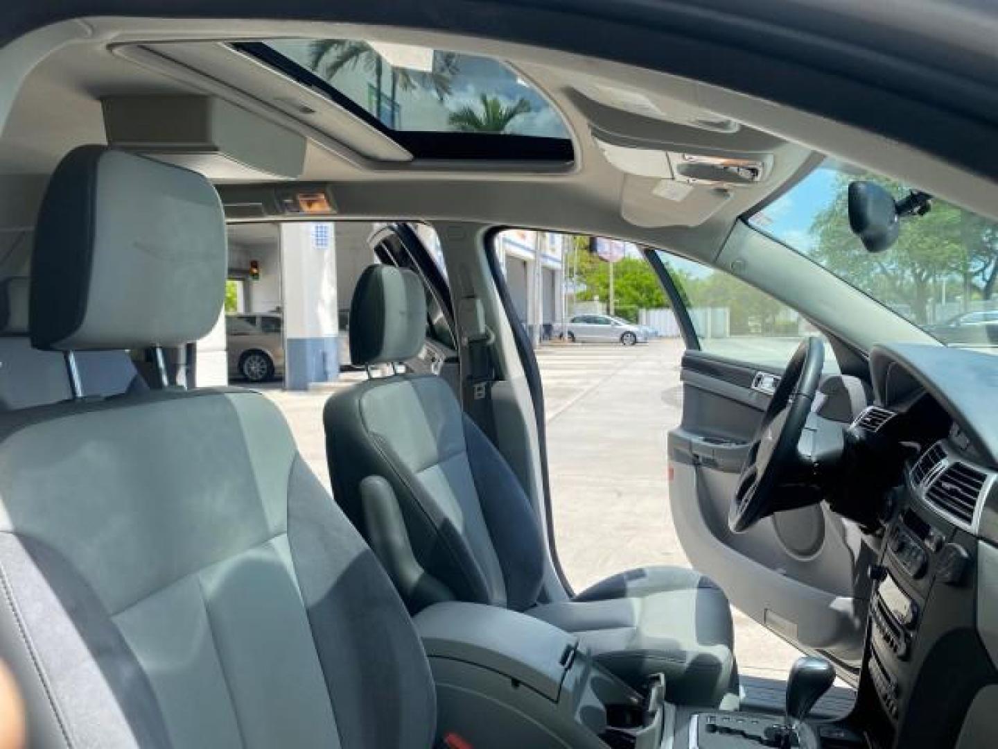 2008 Bright Silver Metallic /Pastel Slate Gray Chrysler Pacifica Touring 1 OWNER NC LOW MILES 55,531 (2A8GM68X38R) with an 4.0L SOHC V6 Engine engine, Automatic transmission, located at 4701 North Dixie Hwy, Pompano Beach, FL, 33064, (954) 422-2889, 26.240938, -80.123474 - OUR WEBPAGE FLORIDACARS1.COM HAS OVER 100 PHOTOS AND FREE CARFAX LINK 2008 CHRYSLER PACIFICA TOURING SIGNATURE SERIES $ 32,895 NEW! VIN: 2A8GM68X38R629737 2 A 8 G M 6 8 X 3 8 R 6 2 9 7 3 7 4 DOOR WAGON/SPORT UTILITY 4.0L V6 F SOHC 24V GASOLINE FRONT WHEEL DRIVE [29W] 29W TOURING SIGNATURE SERIES CUS - Photo#12